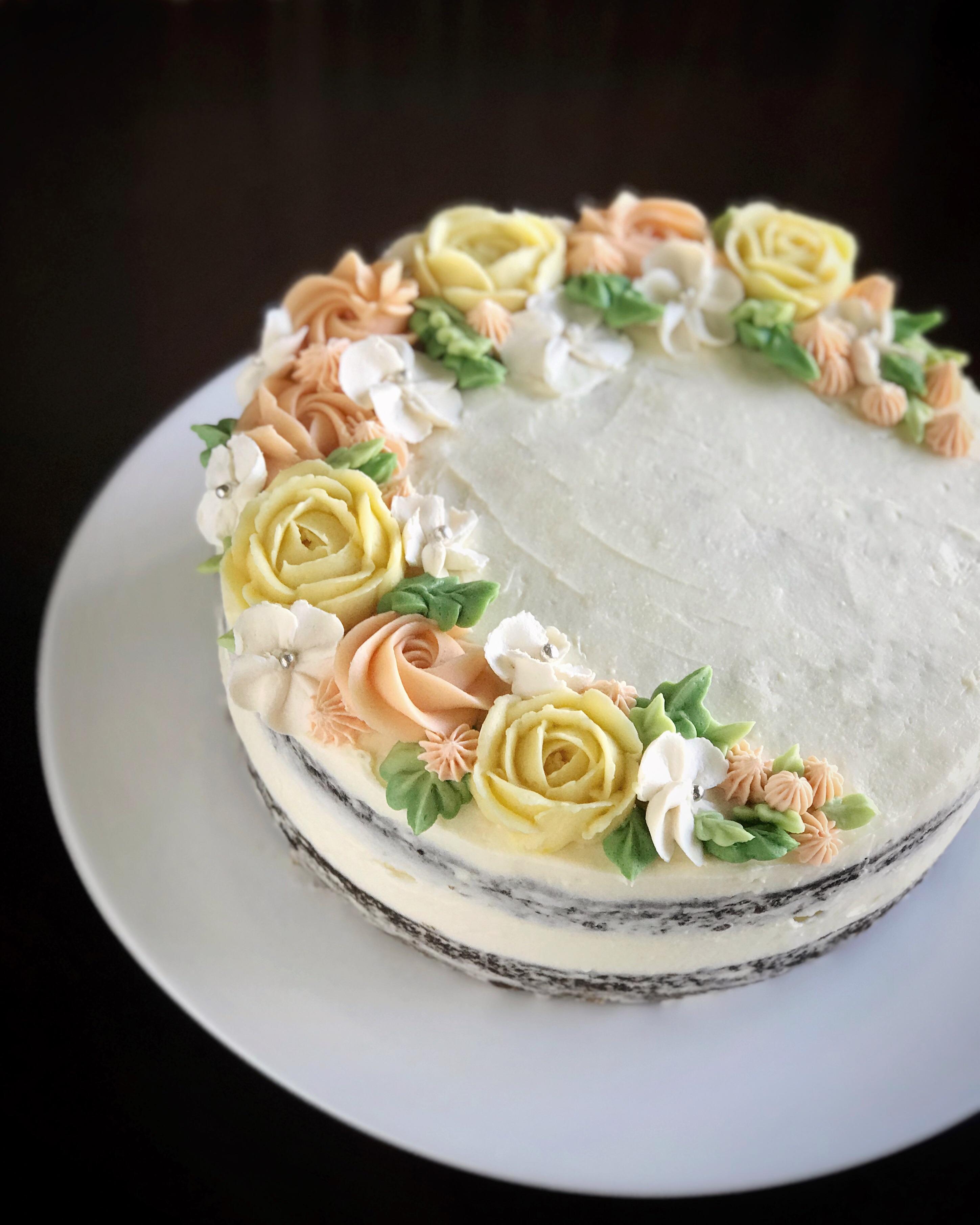First successful attempt at piping buttercream roses! ☺️ Carrot cake