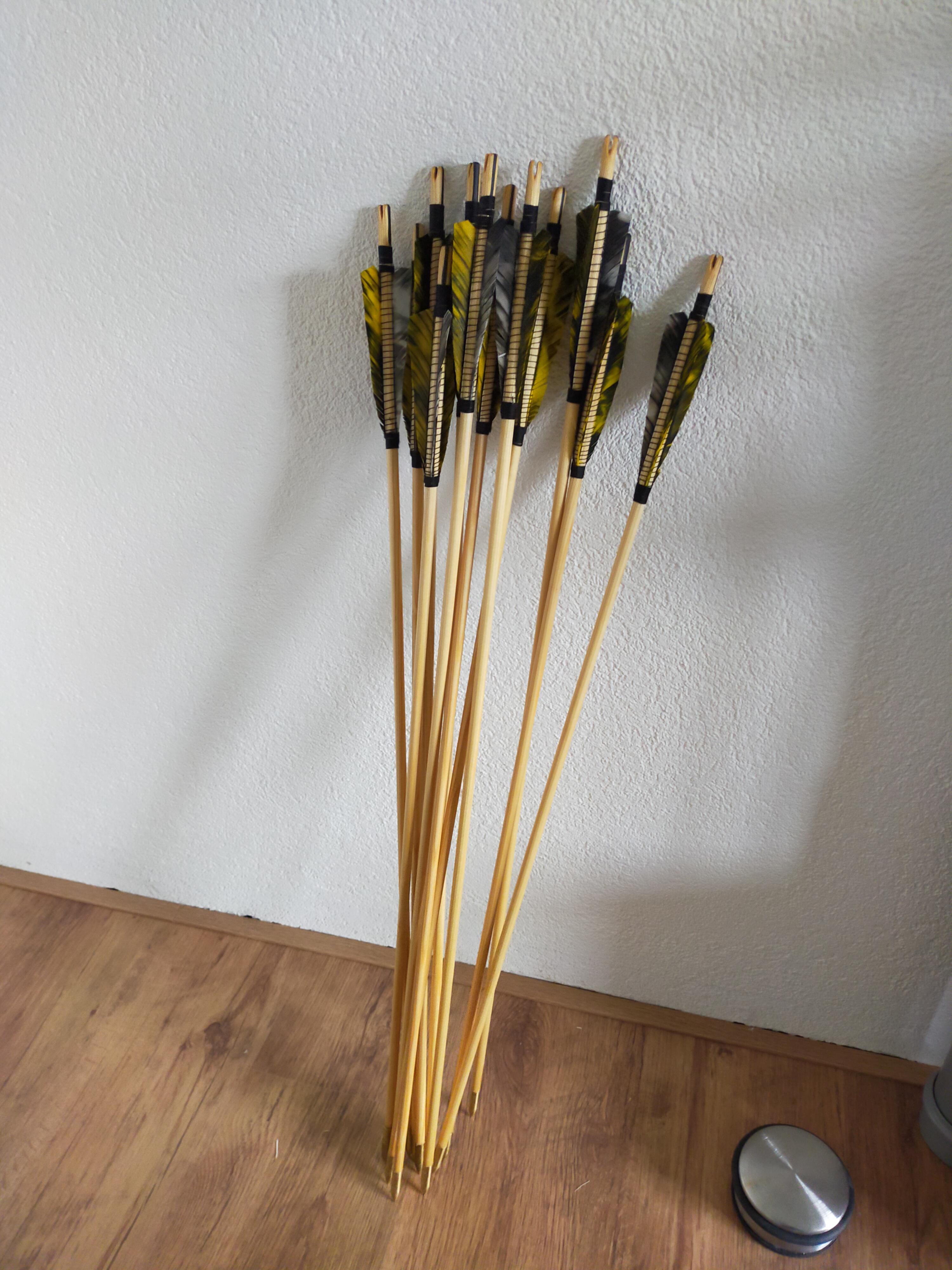 20 yards, Diamond Edge 320 RAK, shooting peepless with a release. So