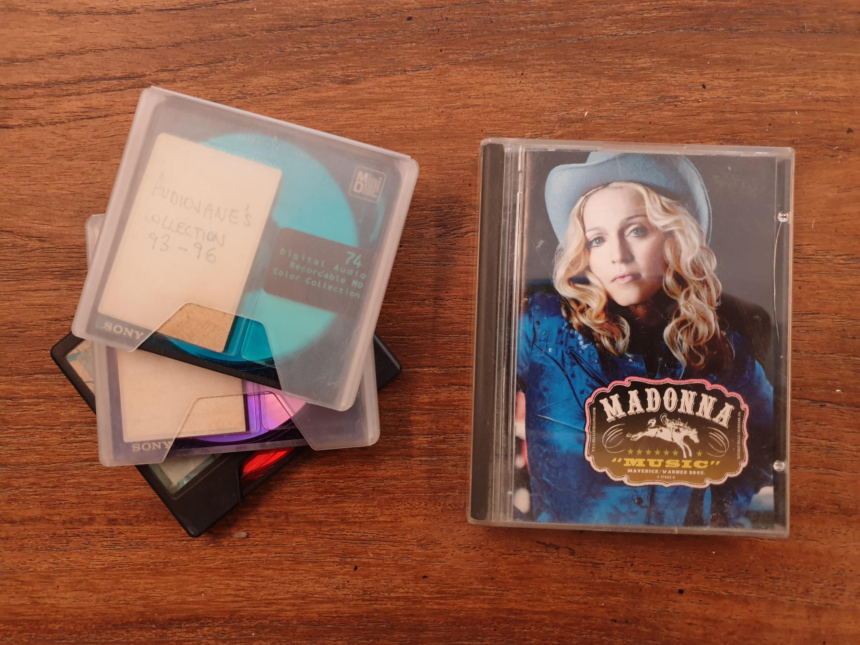 The last few minidiscs I own, including Madonna's "Music" album. r