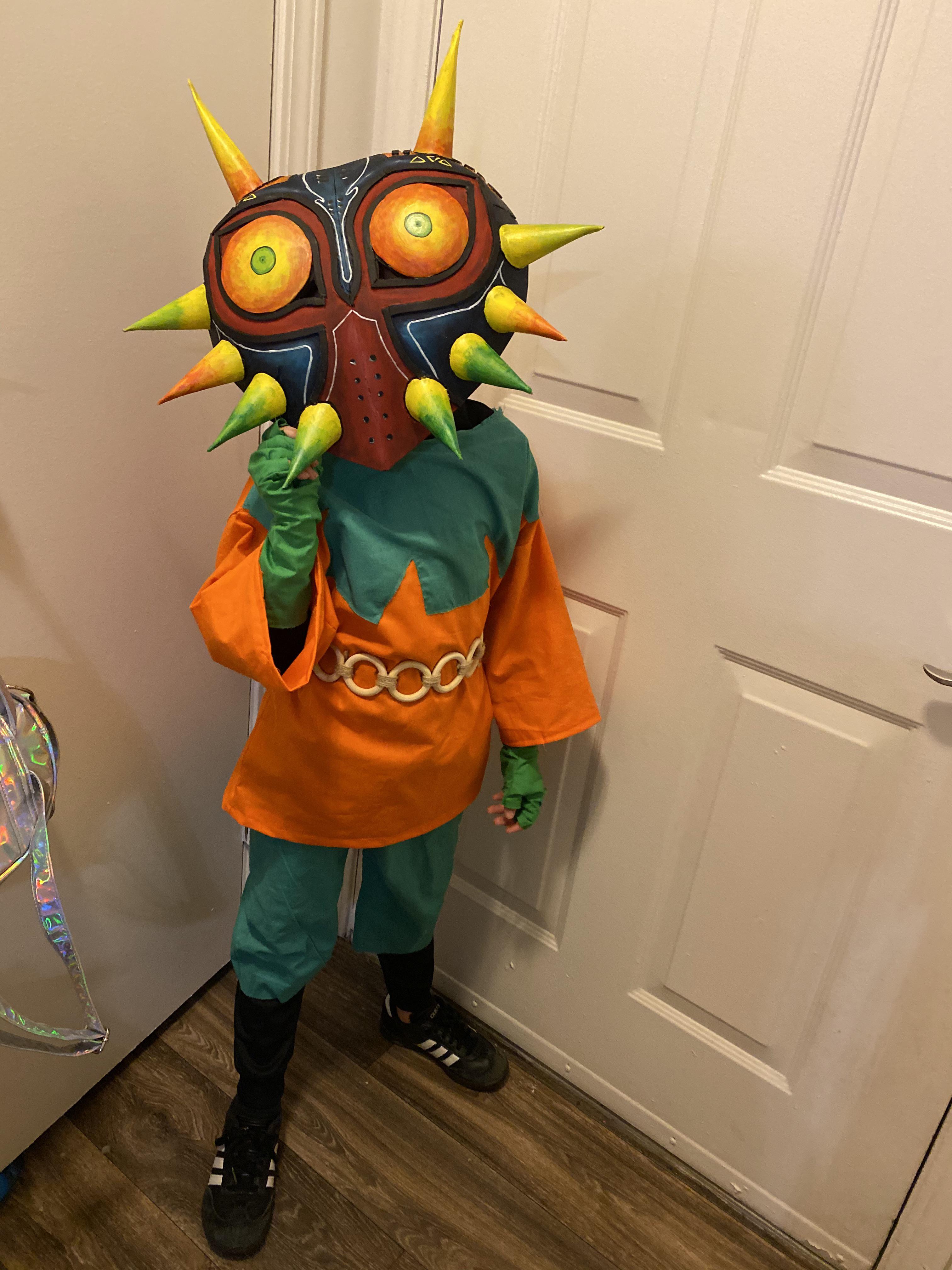 I sewed the costume and /u/geekeryandcoffee made the mask! Skull kid