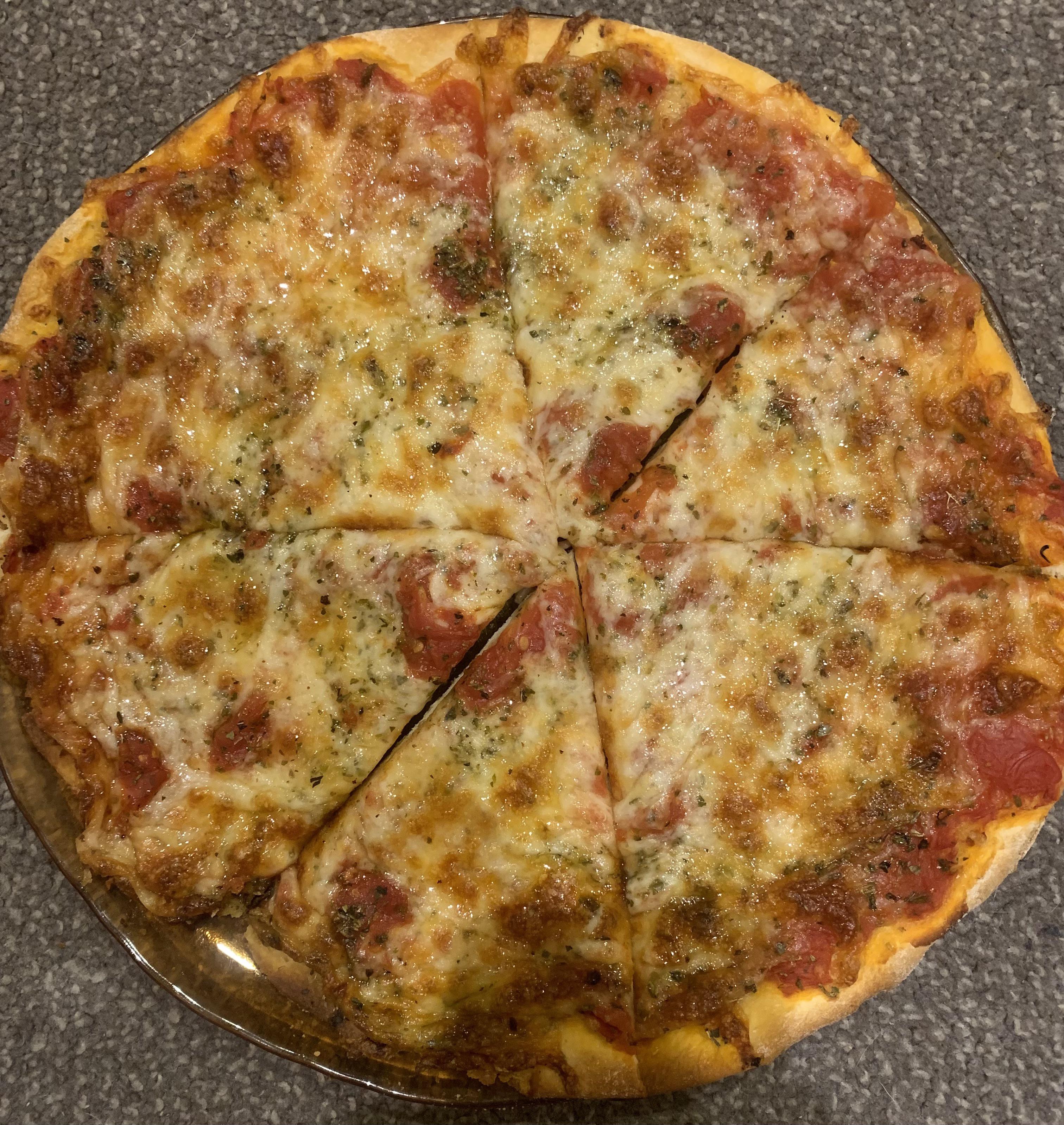 My first ever homemade pizza. Made the dough and sauce myself too. I