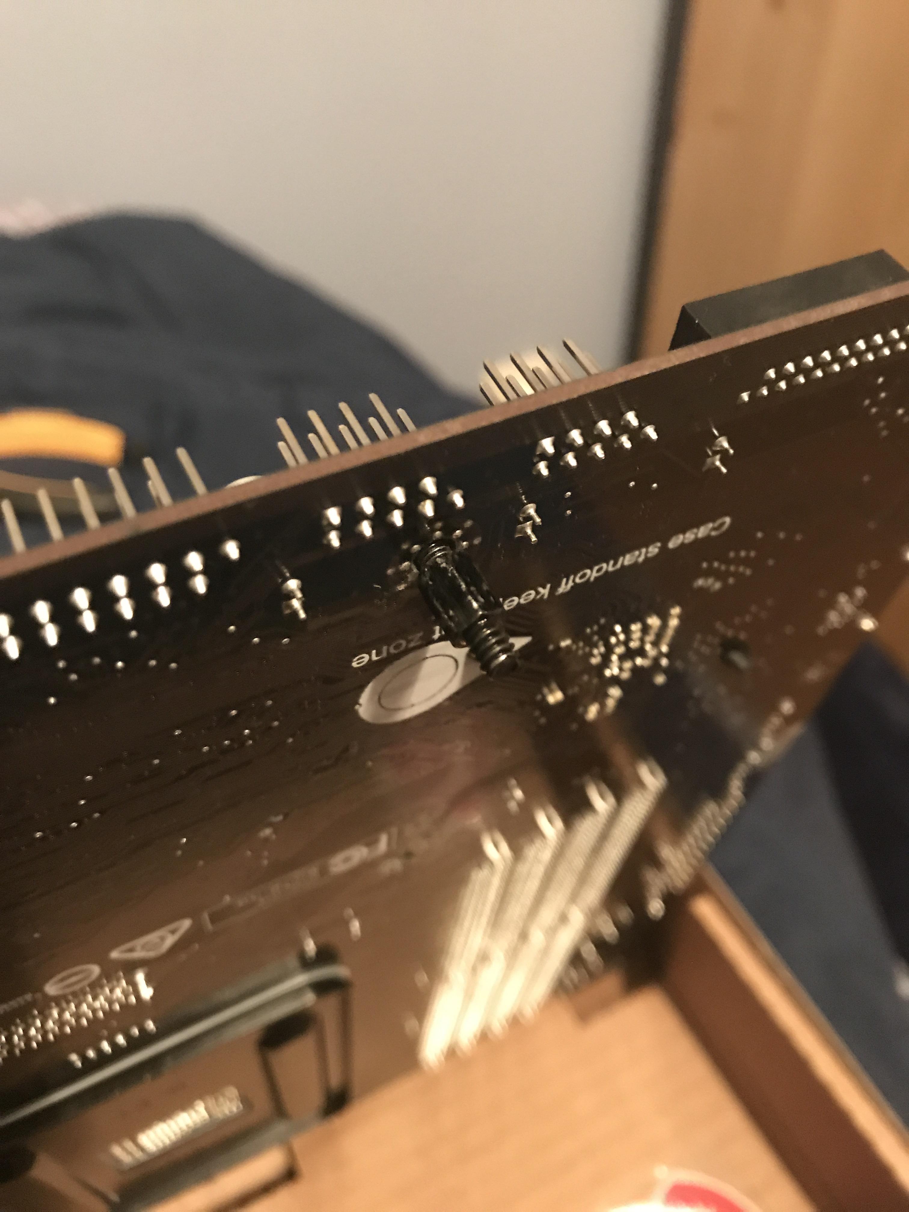 Help removing standoffs from my motherboard. My motherboard was