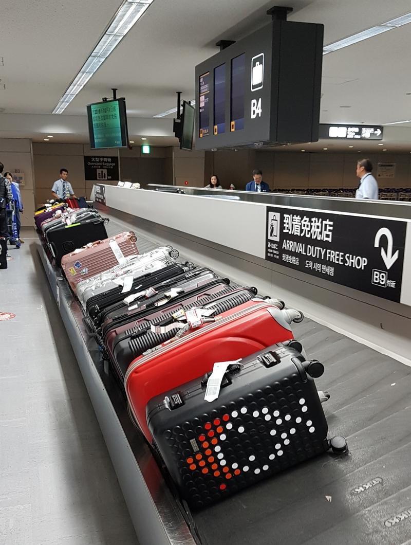 At Narita airport in Tokyo they neatly line up your suitcases with the