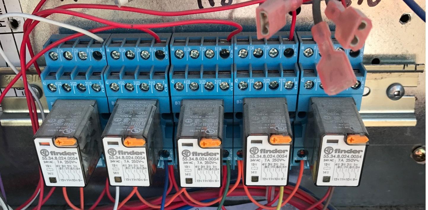 What are these relays in a 10ton rooftop/what do they do? From left to