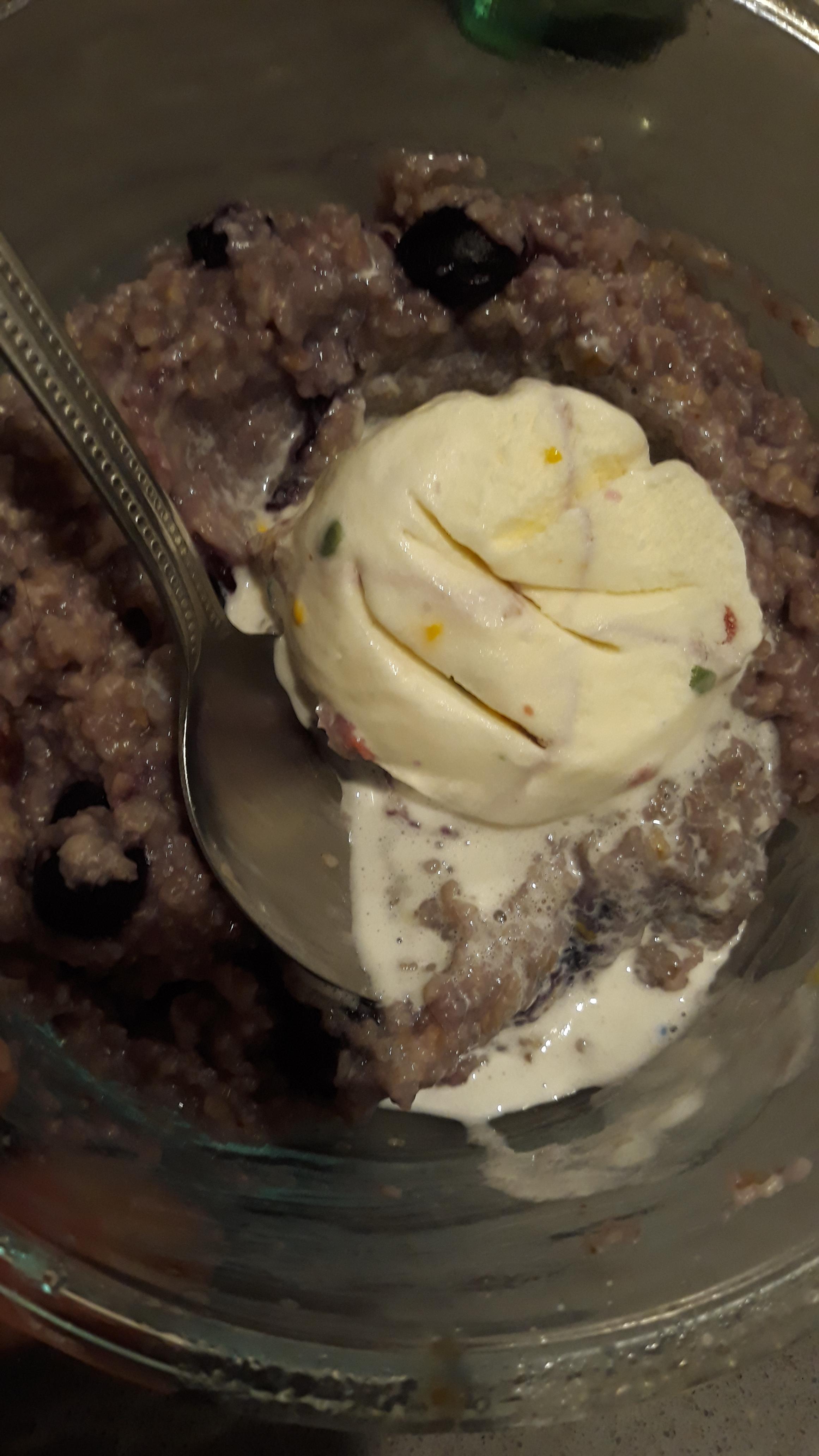 Oatmeal topped with ice cream from the other dau r/CA_Kitchen