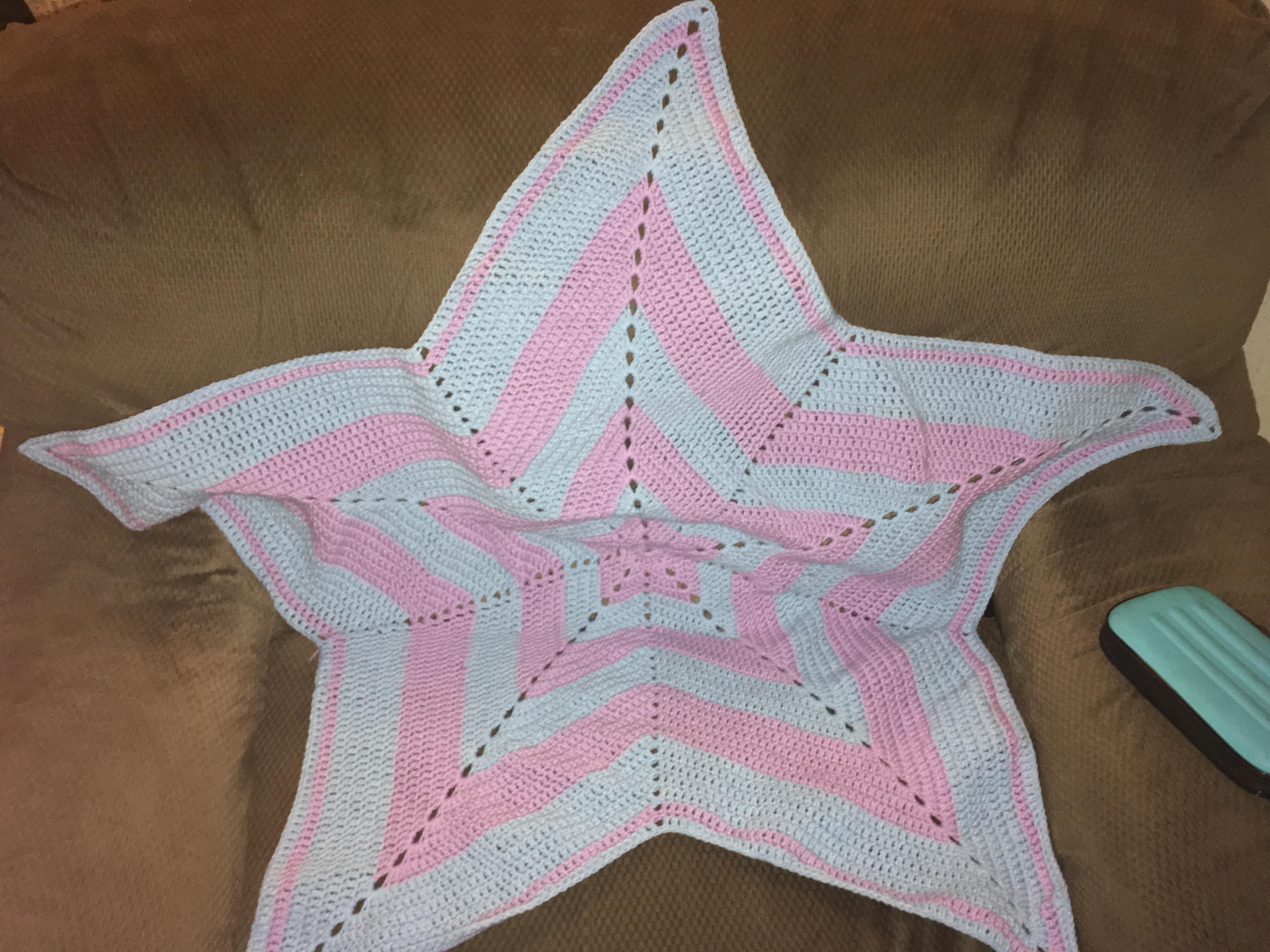 Just finished. Lavender and baby blue star blanket. This got extremely tedious in the last few