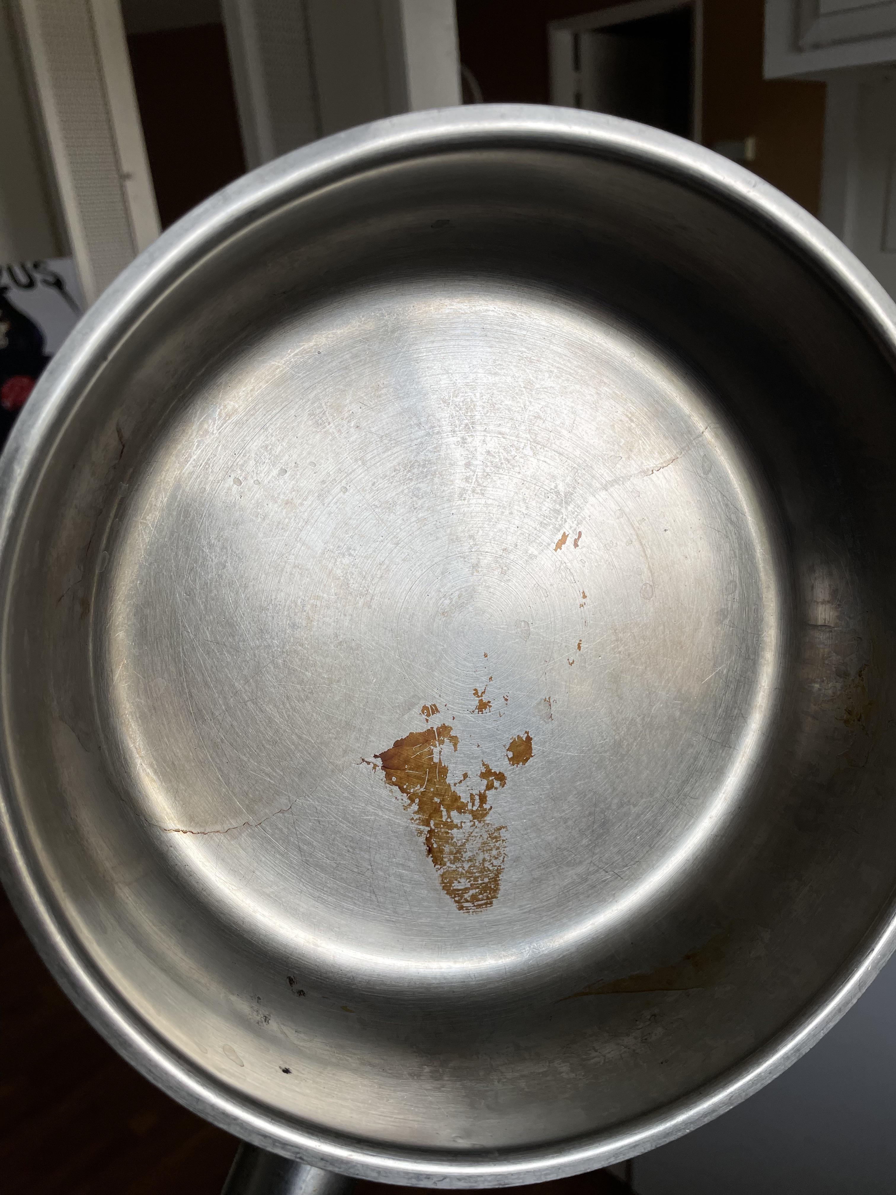 Any tips on how to get rid of burnt oil stains on a pan like this? r