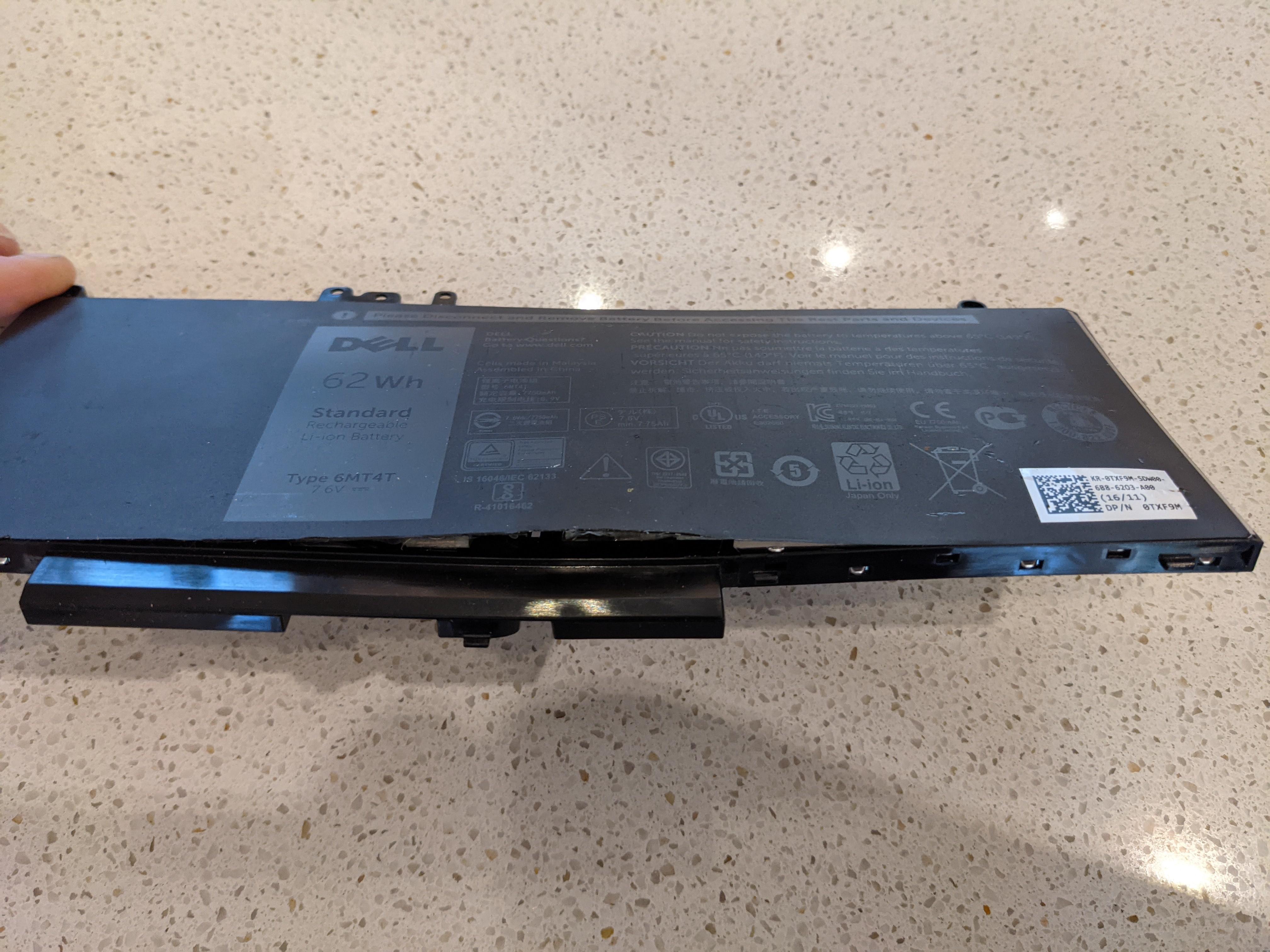 Dell battery extremely swollen r/Dell