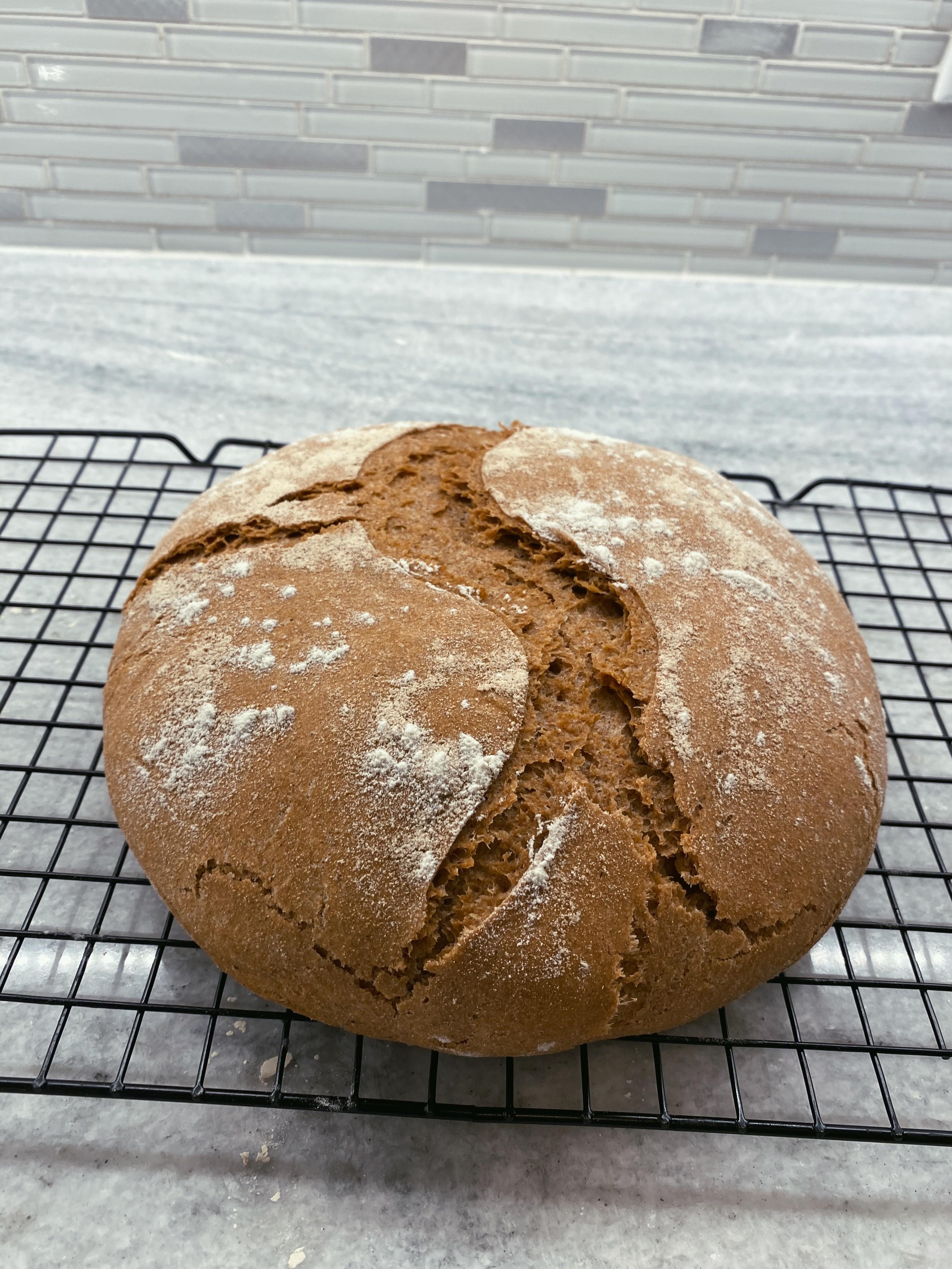 Whole wheat sourdough loaf! It didn’t rise a lot while in the oven, any