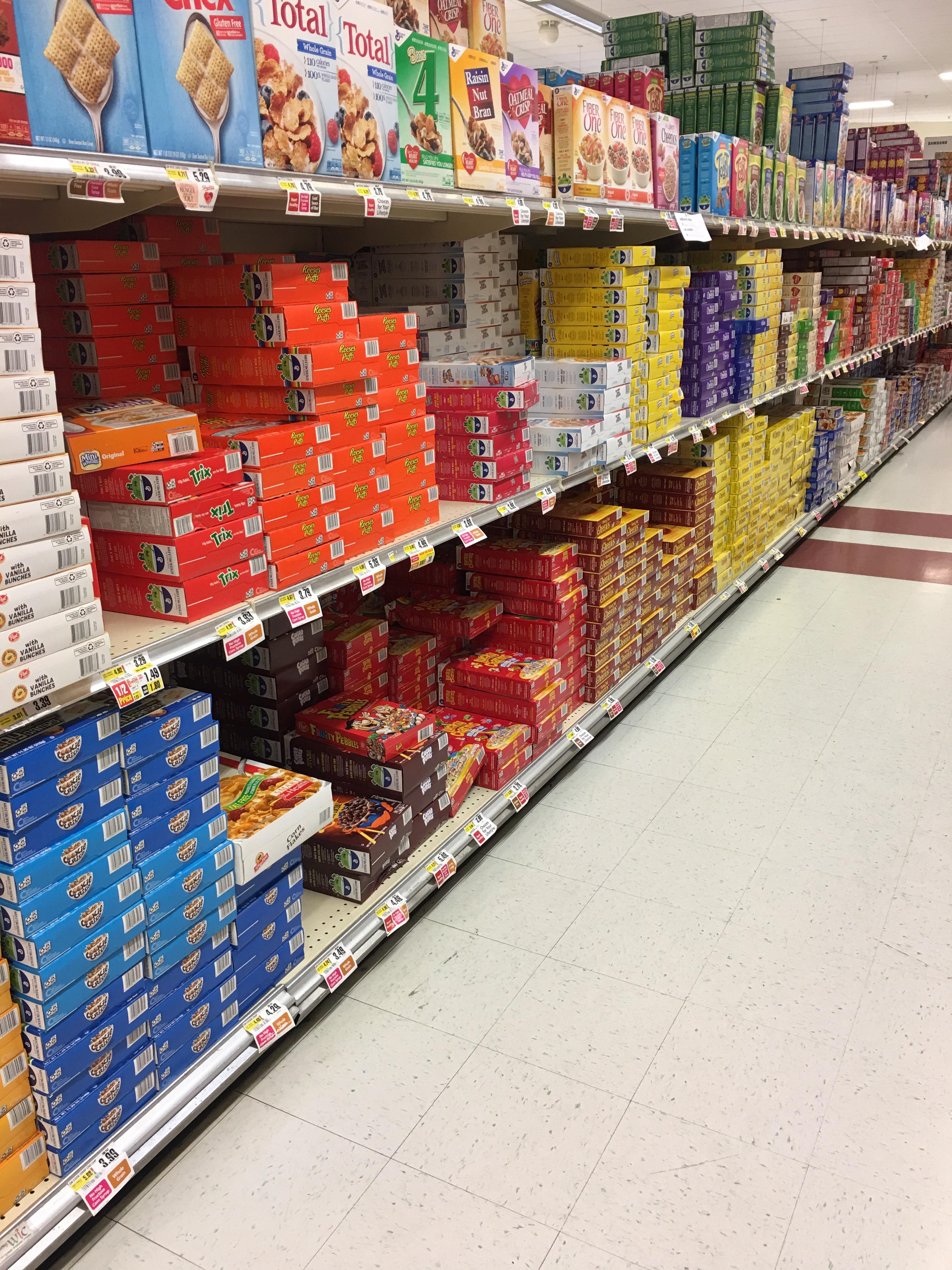 This store puts most of their cereal boxes on their side r