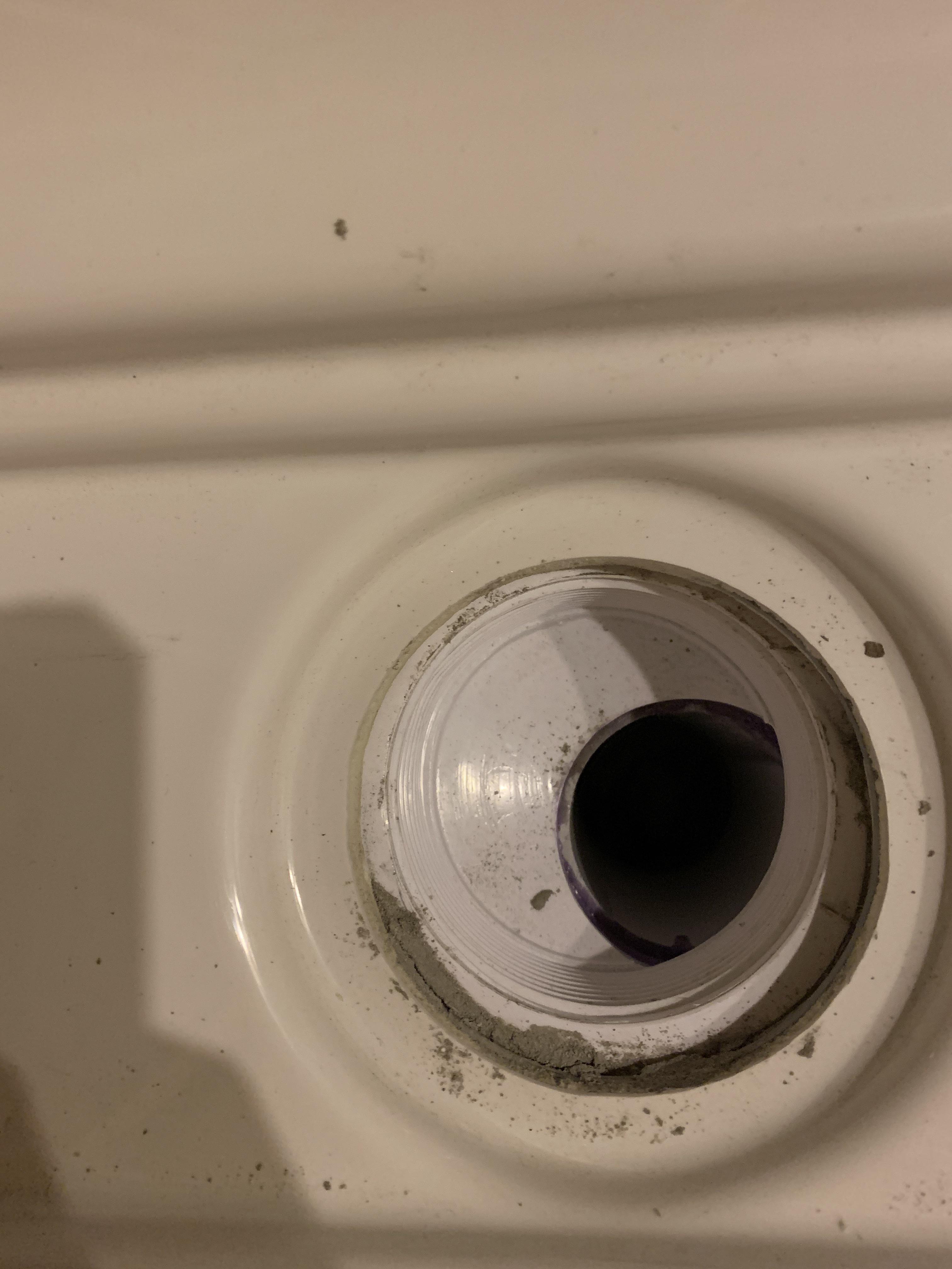 Trying to fix a shower drain roughed in at the wrong location. r/fixit