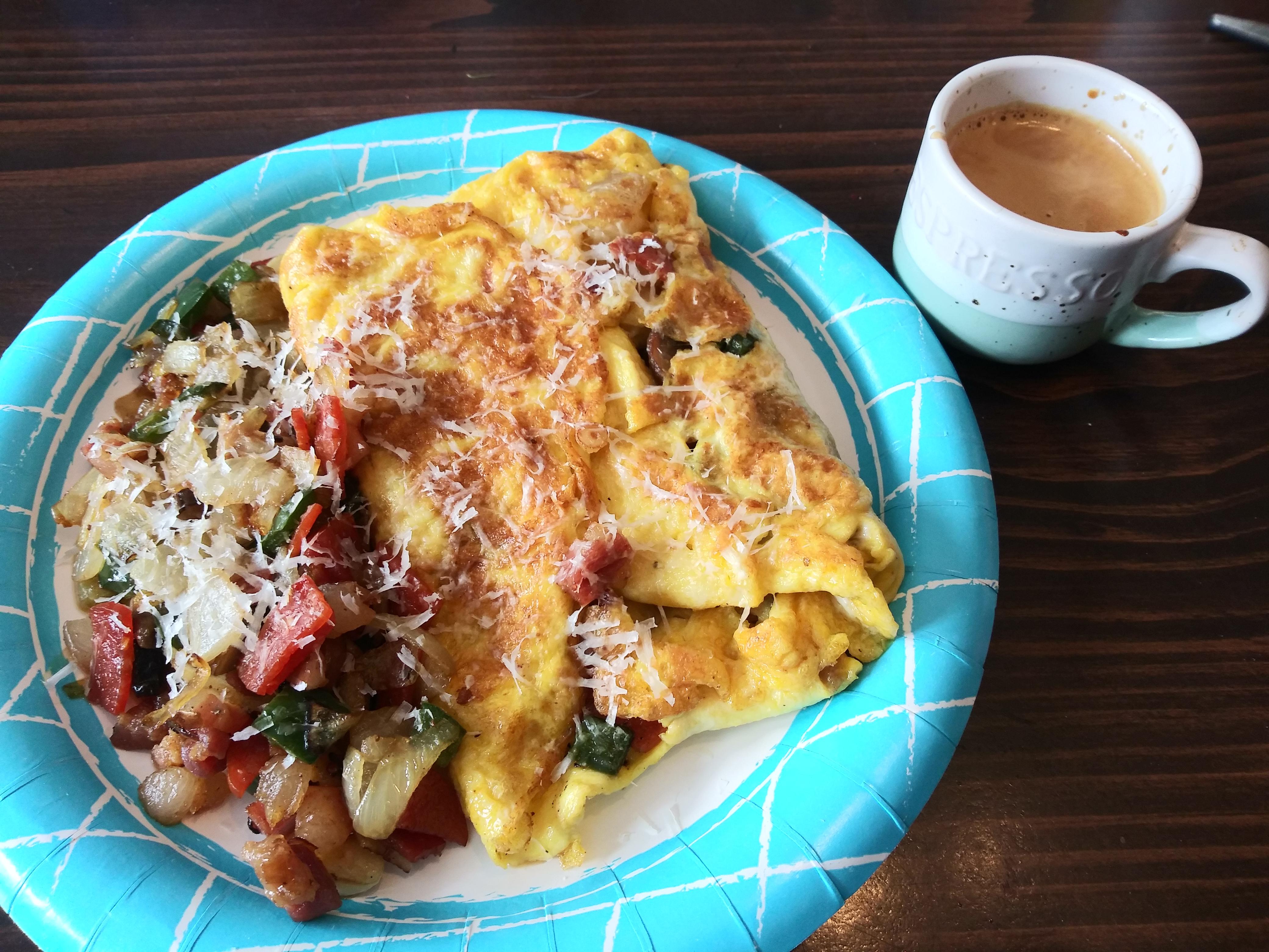 Omelette with mushroom, pancetta, salami, jalapeño, onion, garlic, and