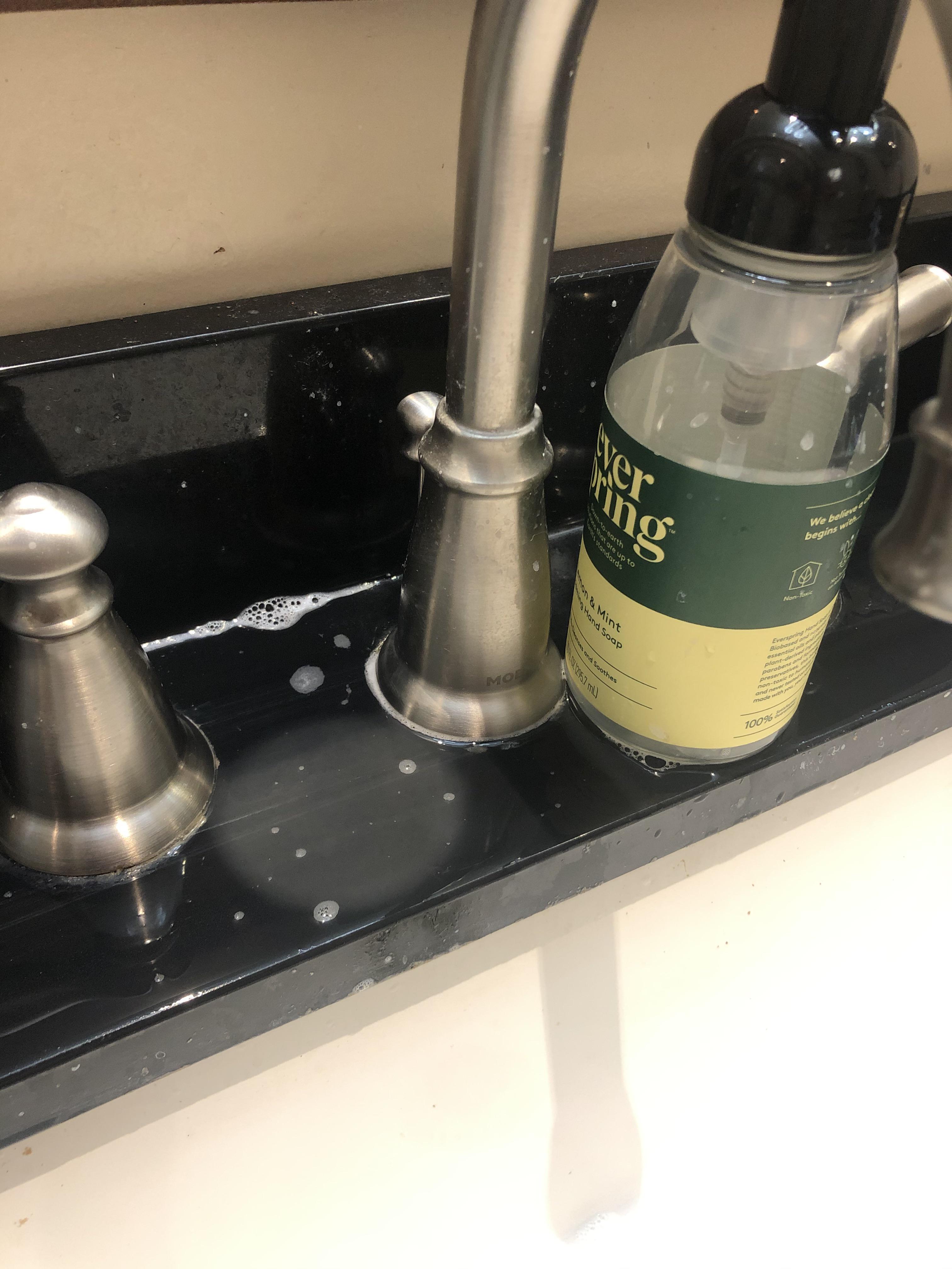 Countertop discoloration where soap bottle used to be r/mildlyinteresting