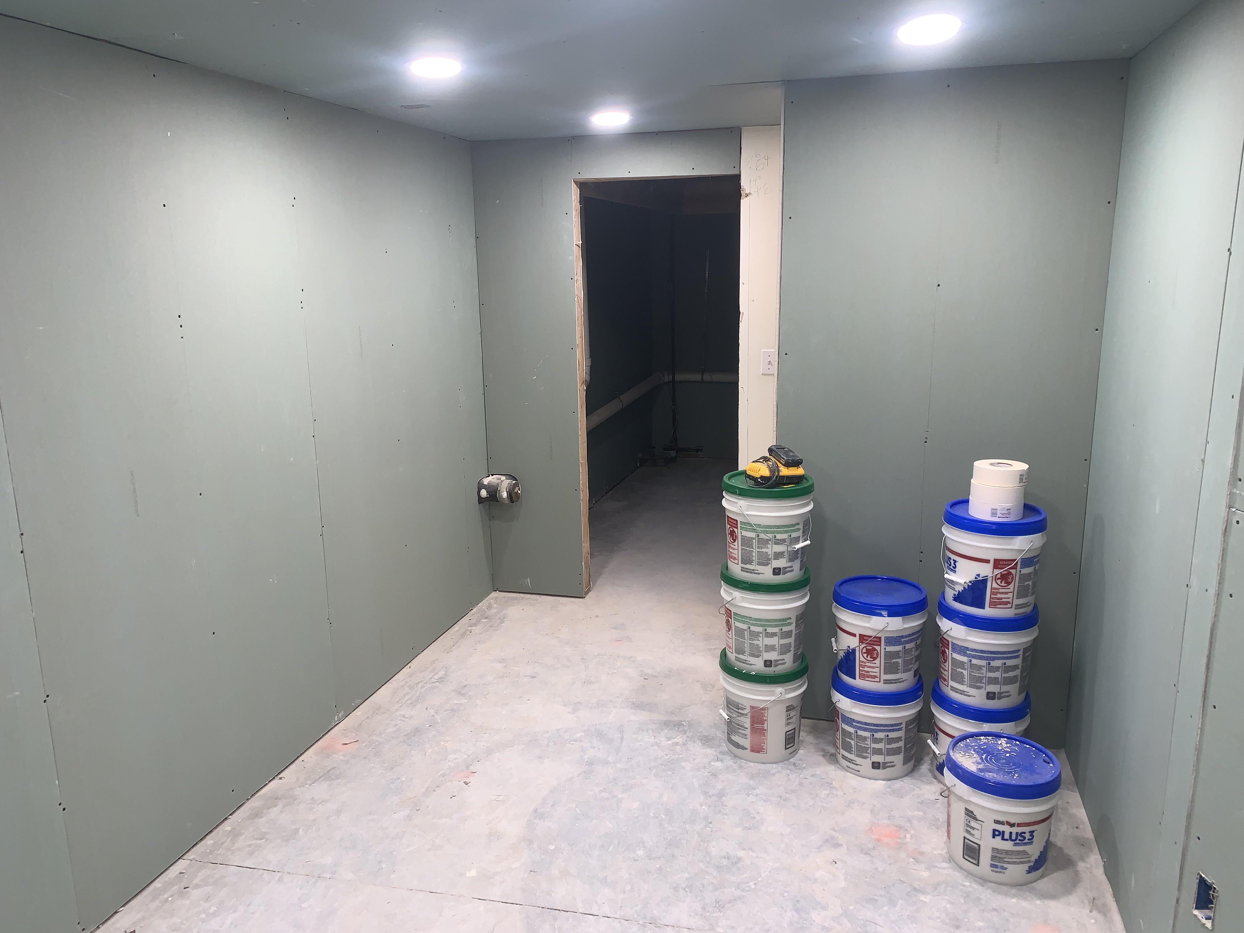 Sheetrock all done . Taping next : Contractor