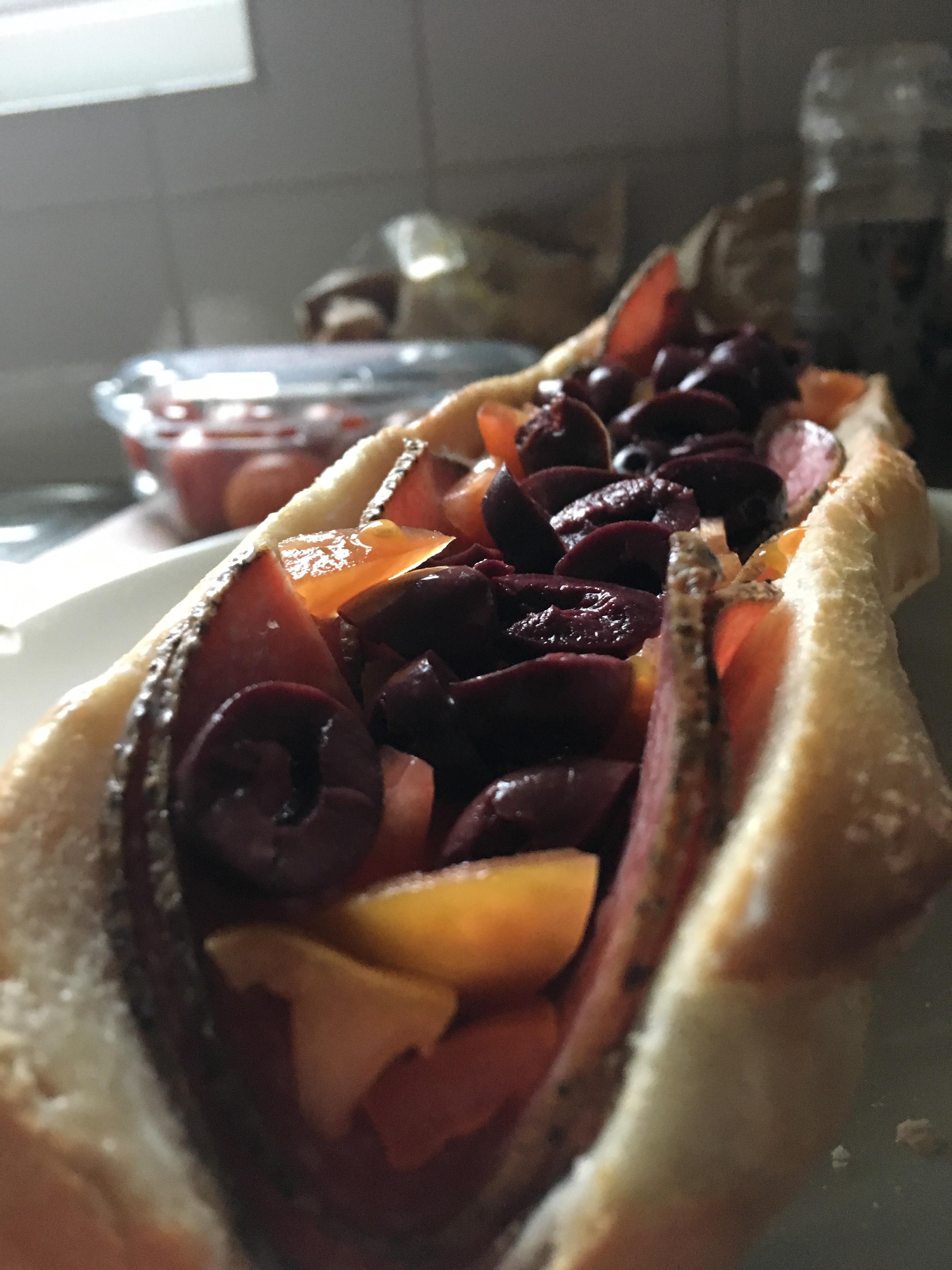 Peppered salami, baby plum tomatoes and kalamata olives r/Sandwiches