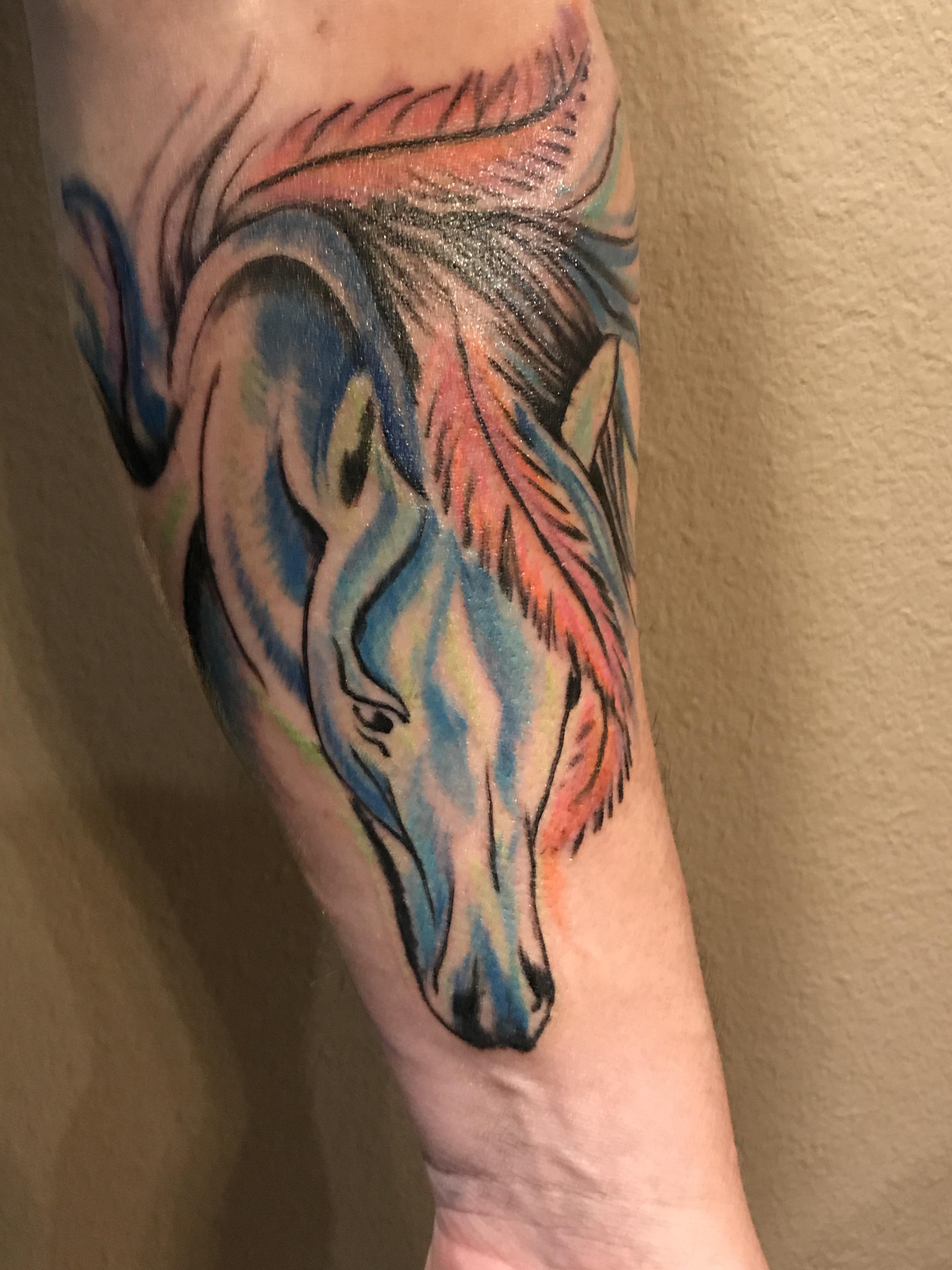 Horse tattoo for my daughter done by Worm at Brickhouse Tattoo in