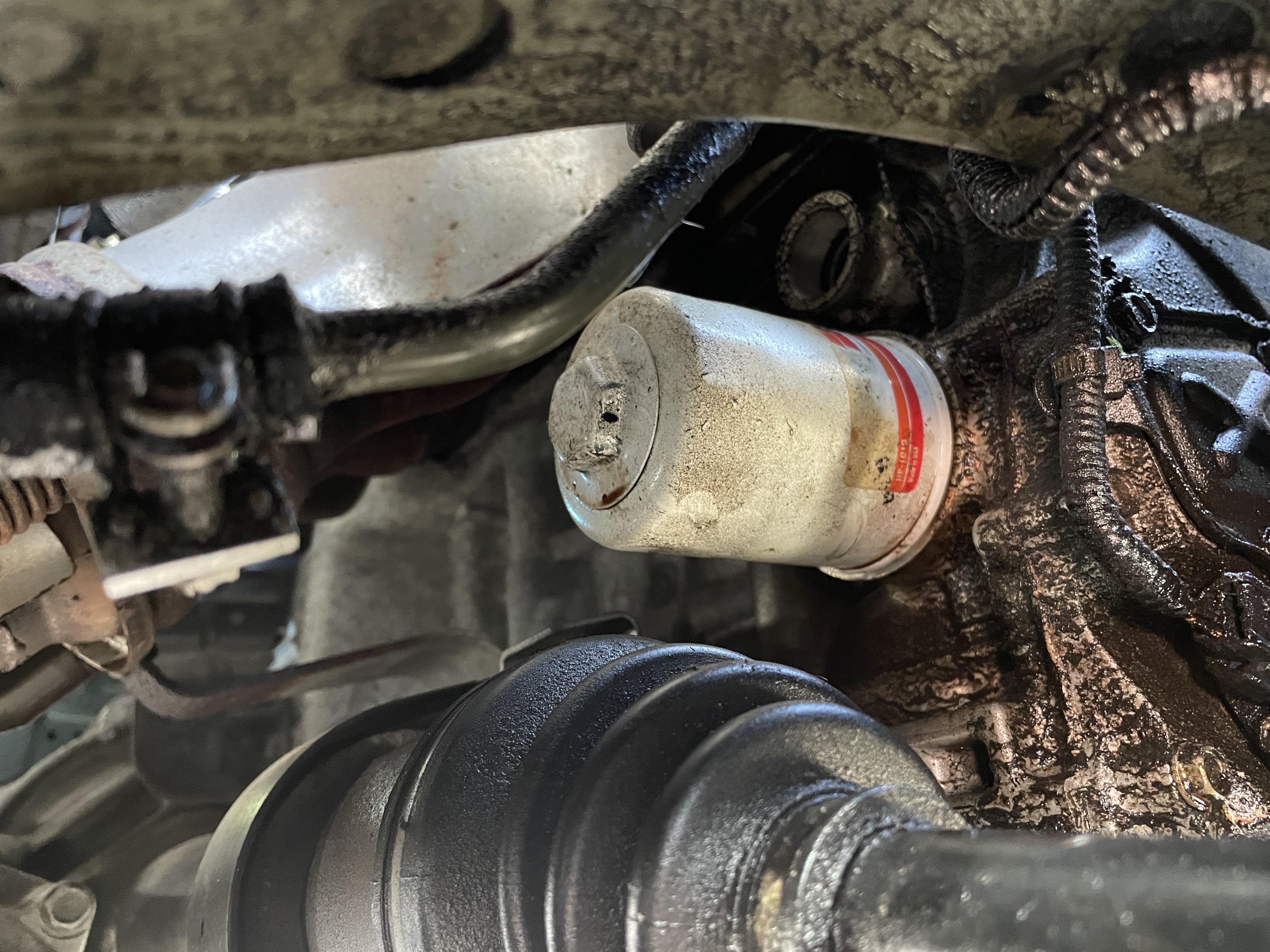 Oil leak, I suspect it’s the filter but should I tighten it by hand or