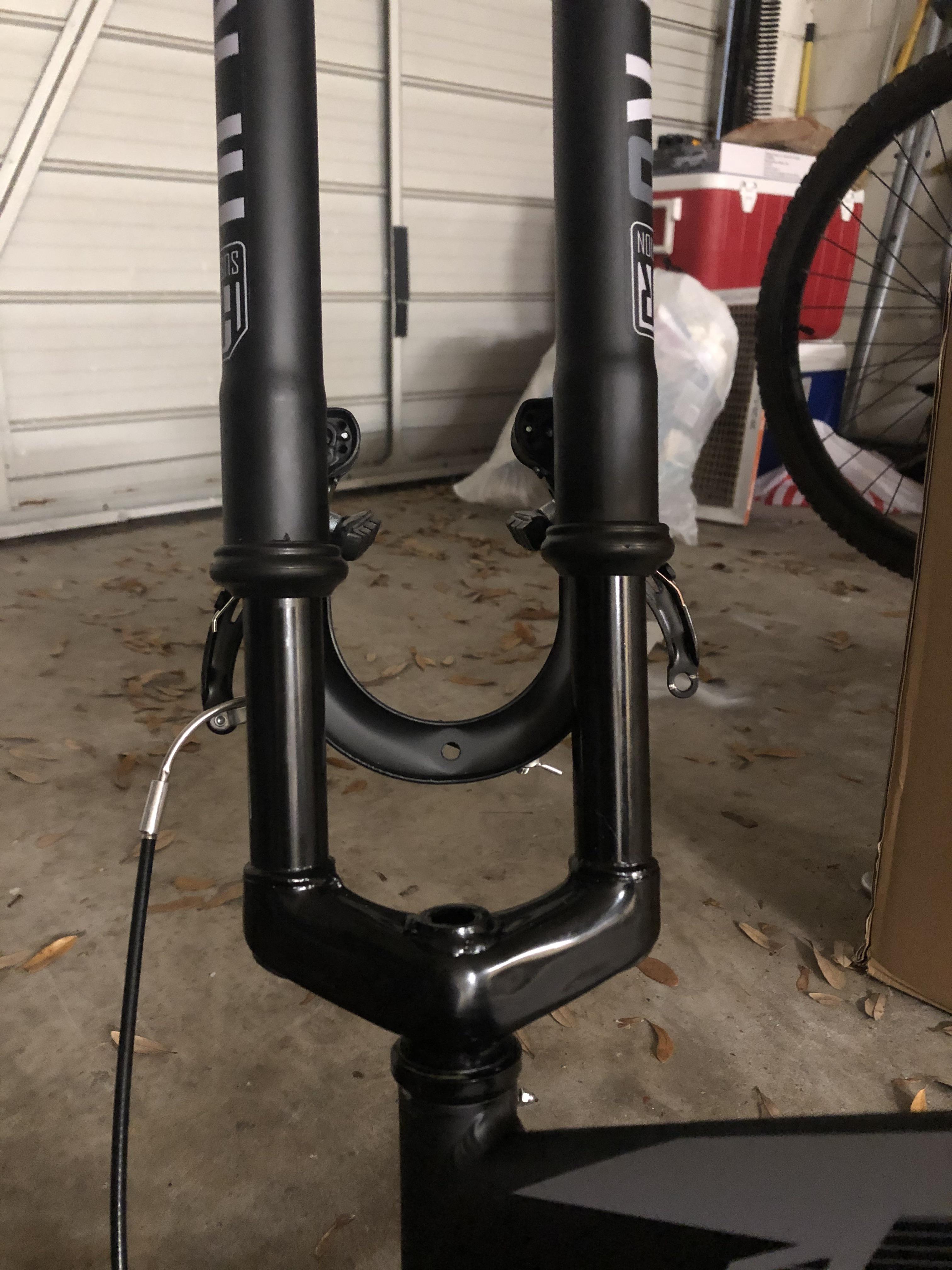 My bike suspension is not level... anyone able to give an answer as to