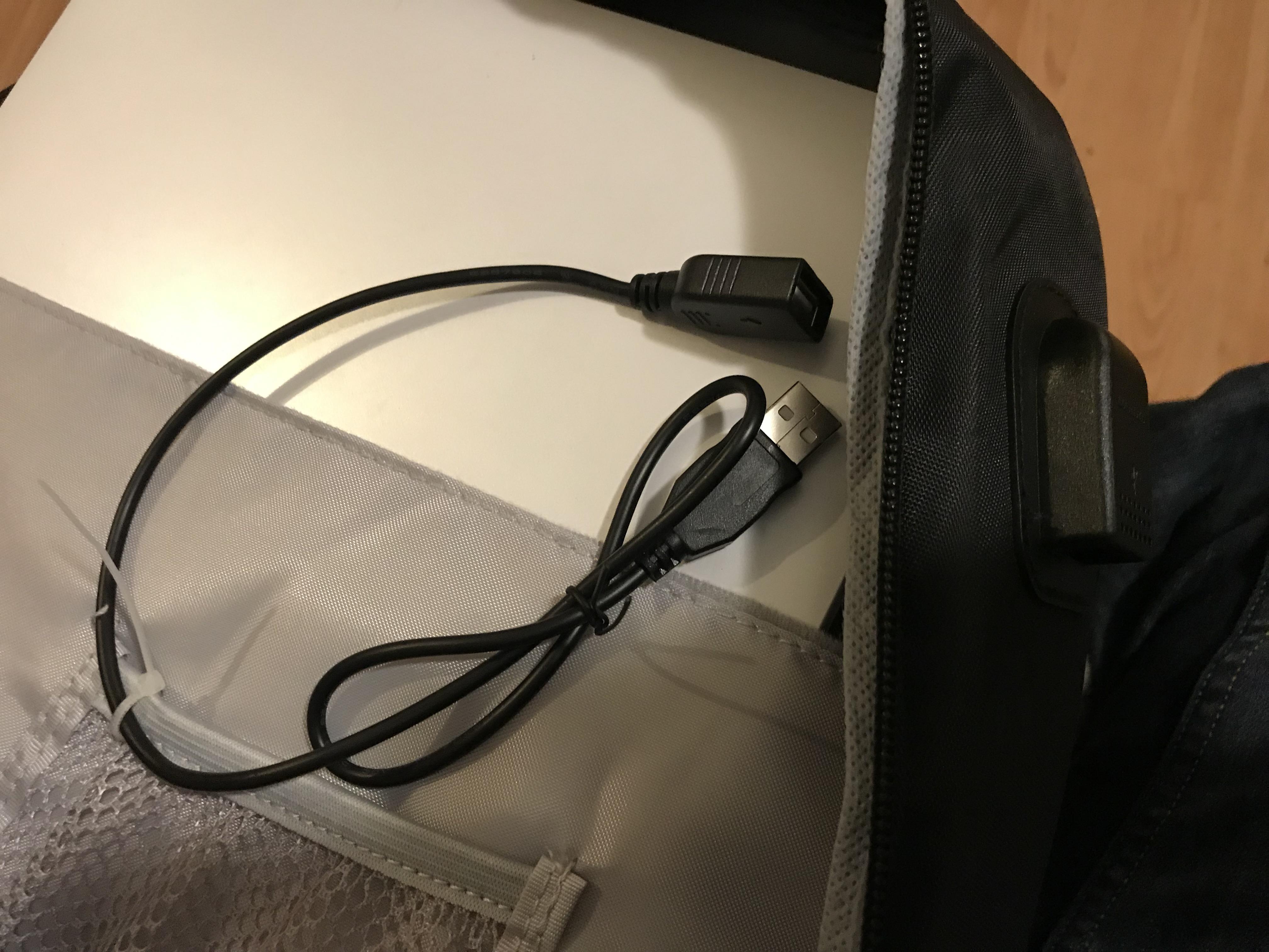 What is this charging thing on my backpack’s outside and the cable that