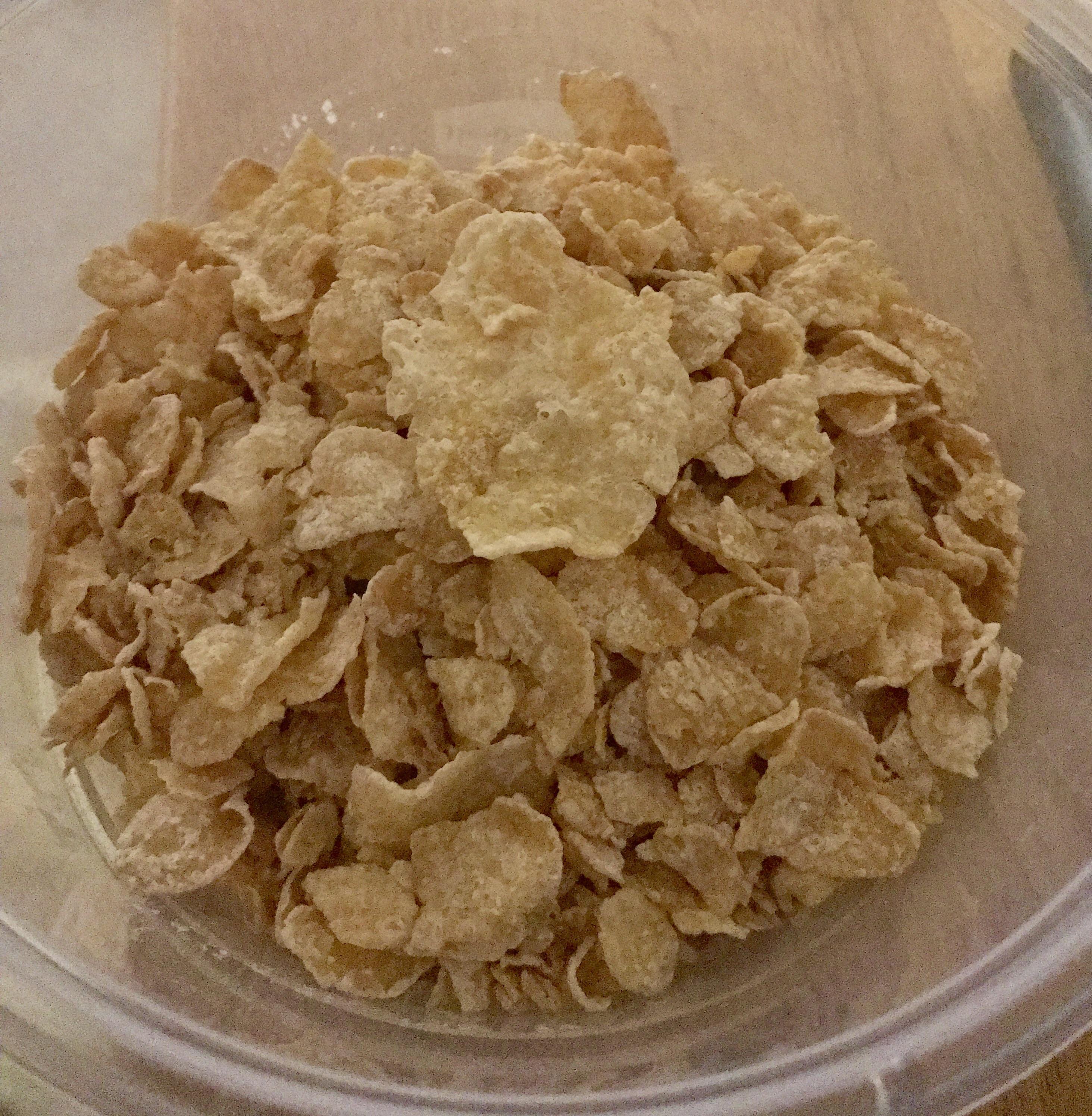 This one massive Frosted Flake among normal sized Frosted Flakes. r