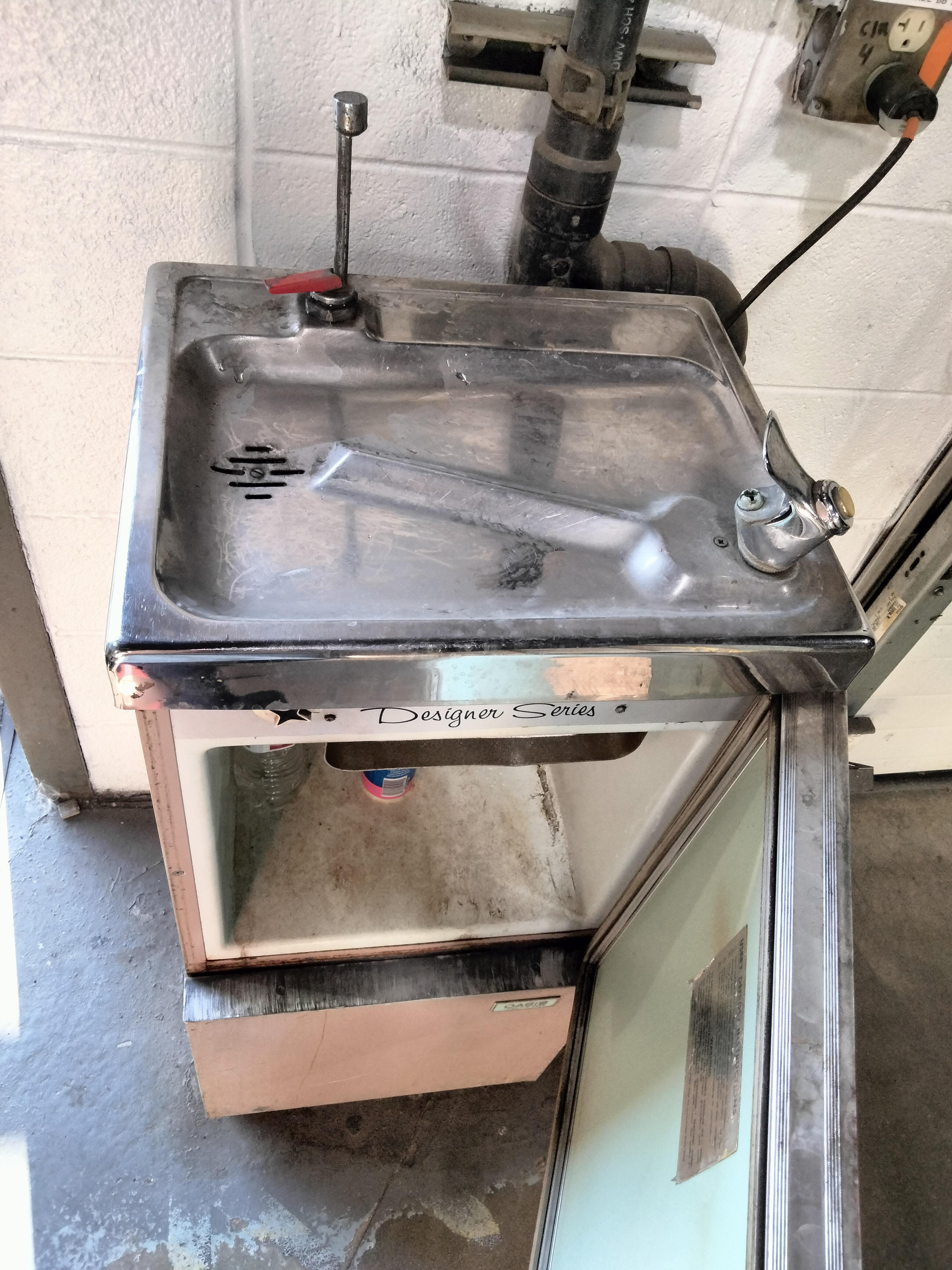 This old 3 in 1 drinking fountain/hot water dispenser(?)/fridge at work r/mildlyinteresting