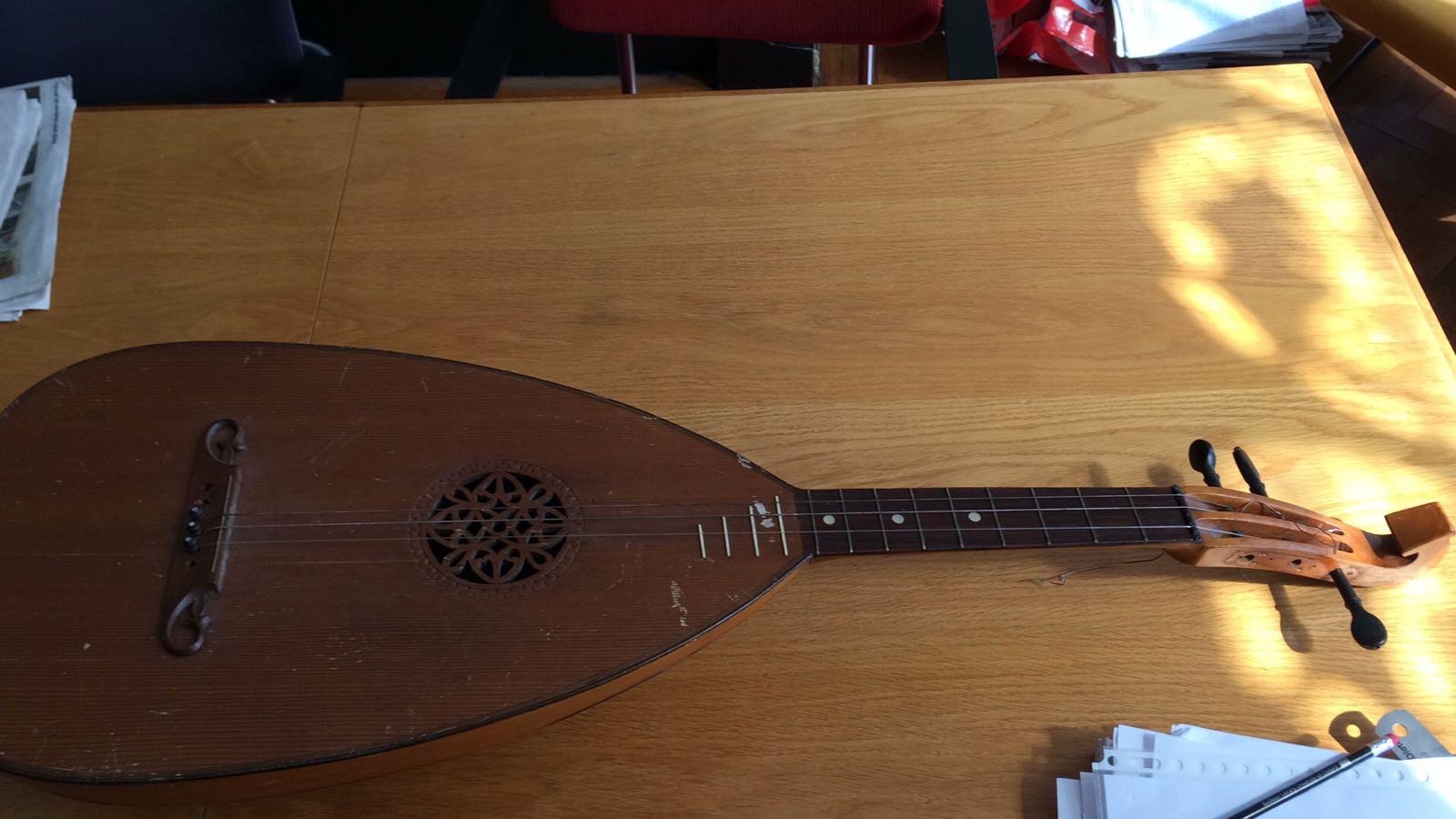 Found this Lute guitar on a market today! story in coments r/UnusualInstruments