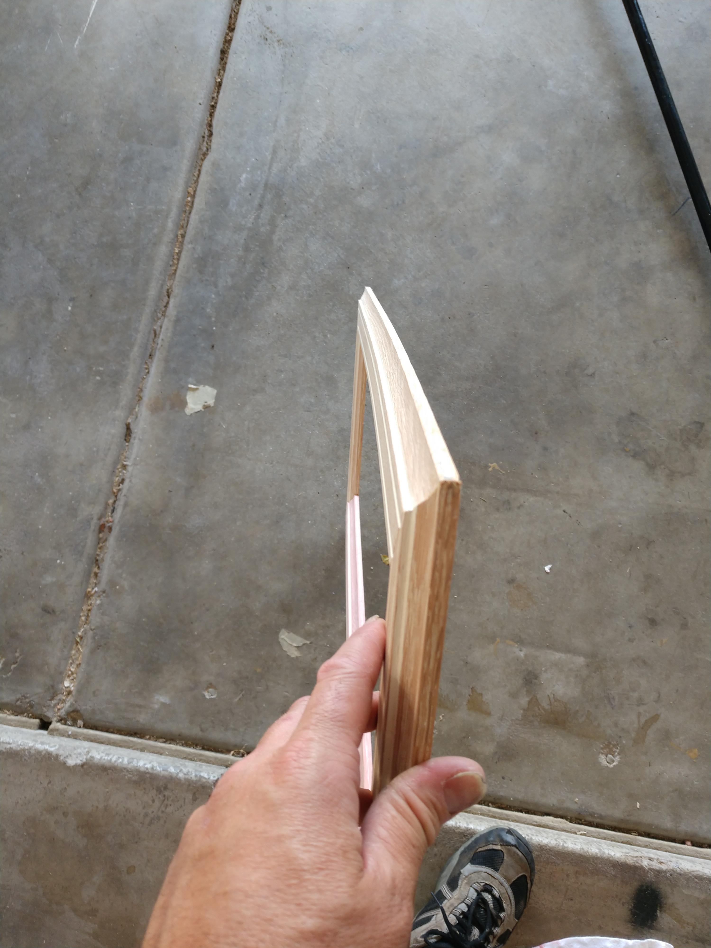 Does anyone have any thoughts on how I can "unwarp" this picture frame