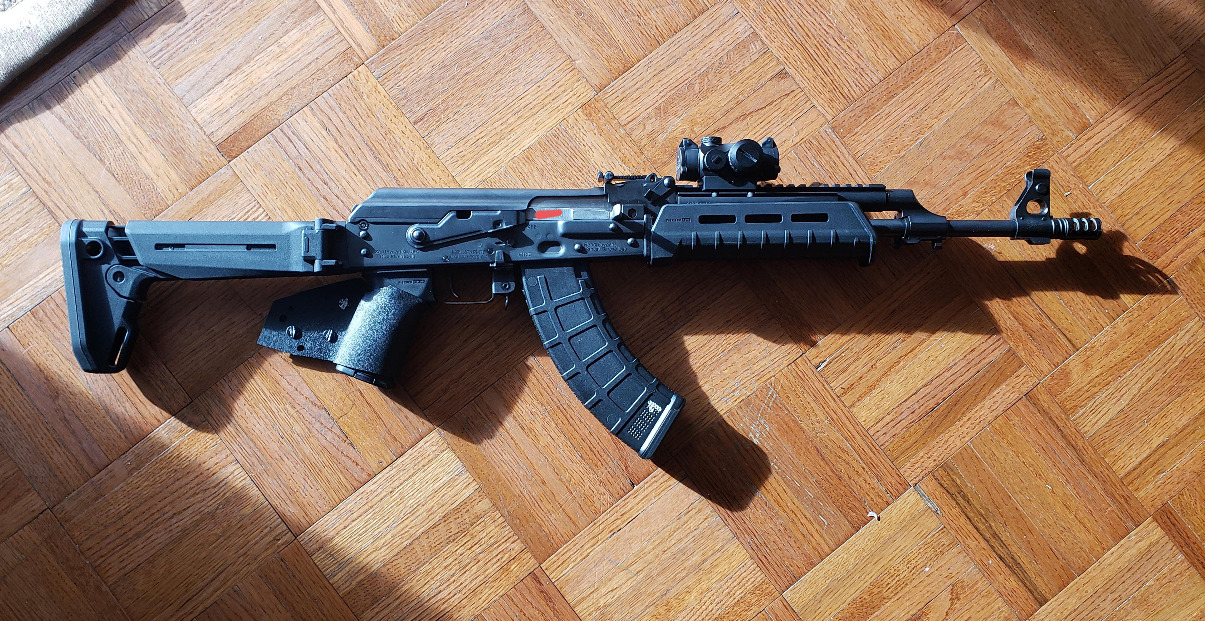 My M70. Yes, the Magpul handguard fits fine with very minor modifications. (mag is a 10/30 for