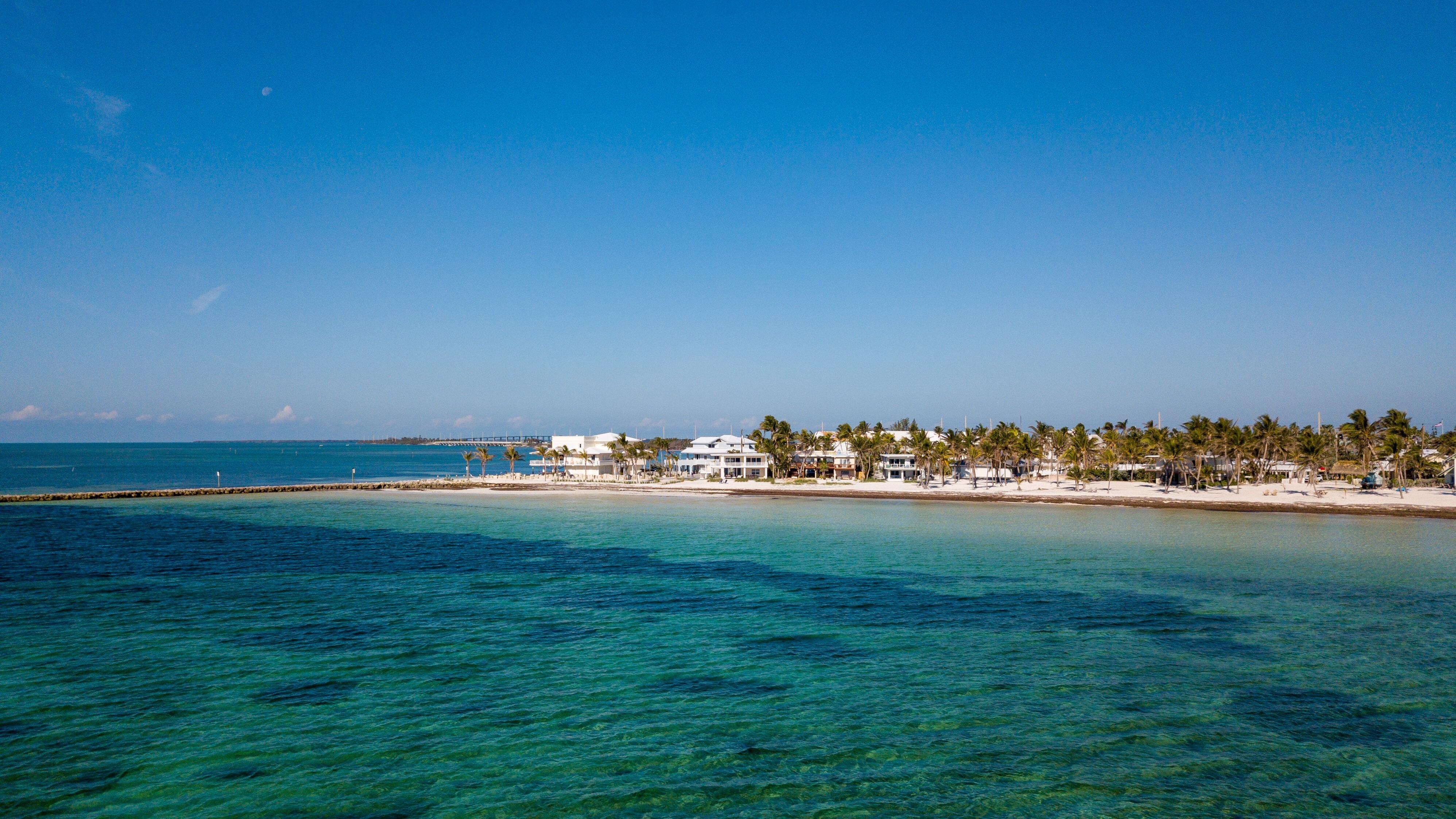 Hello! Drone over the ocean off the beach along Sunset Drive