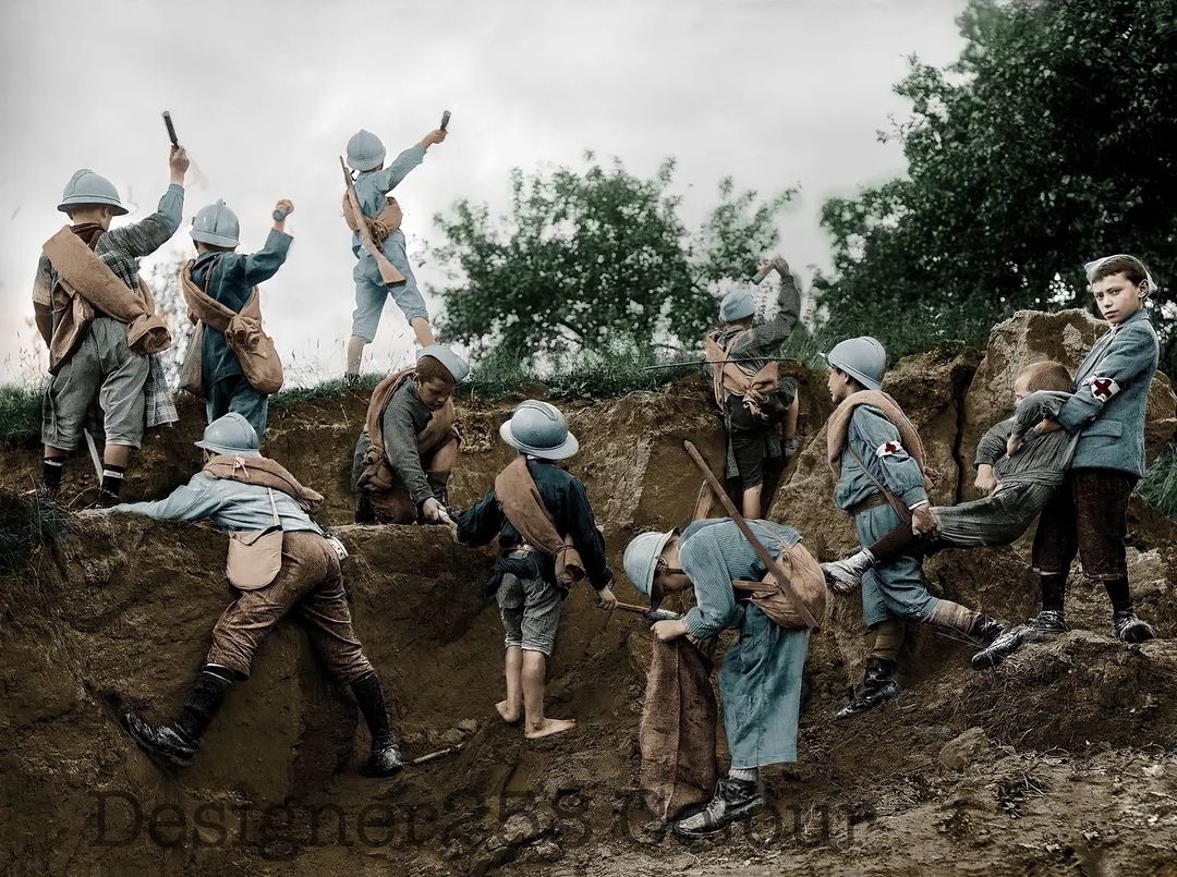 French children playing frontline soldiers with full equipment and