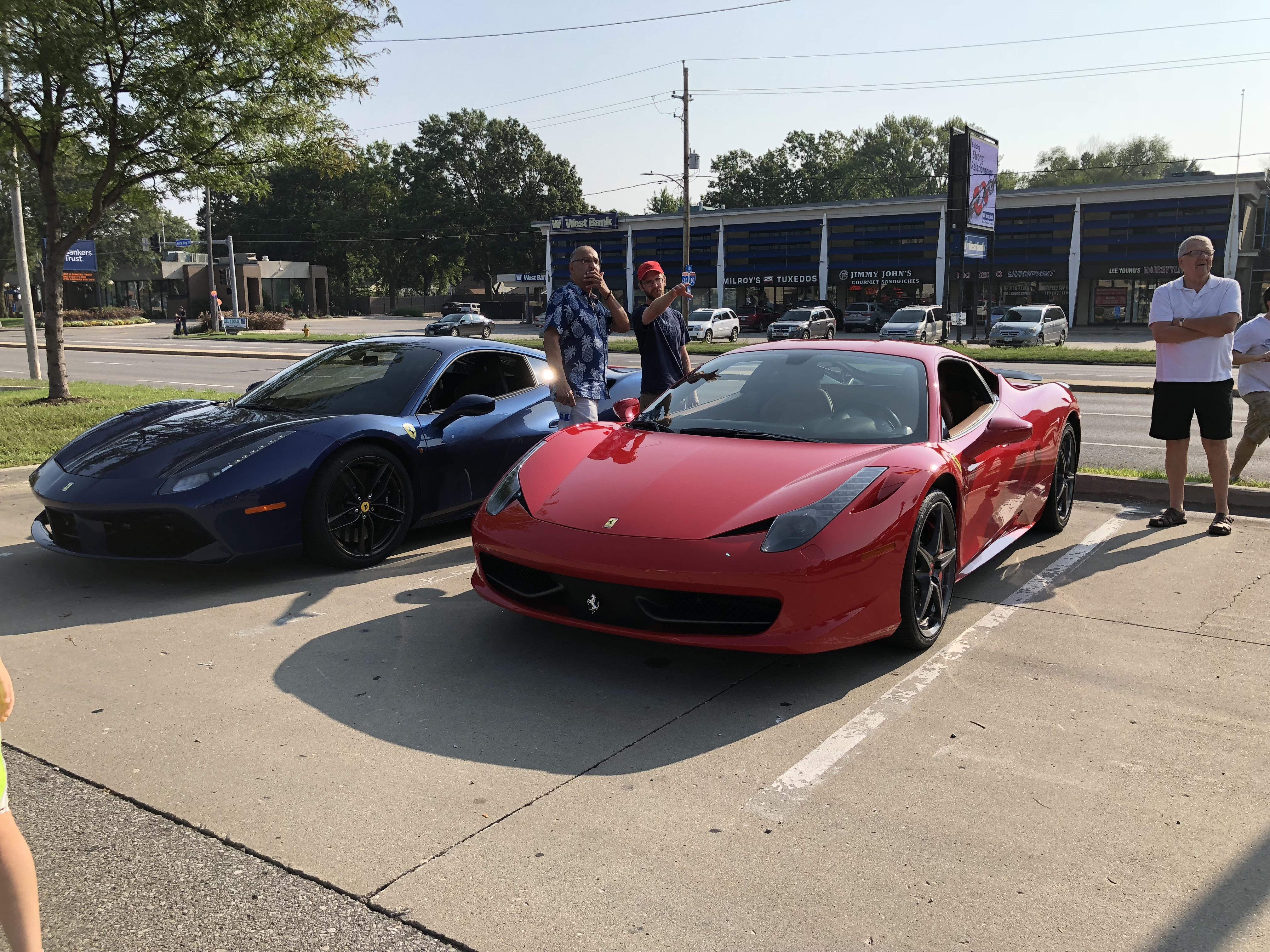 Ferrari 458 Italia(red) & Ferrari 488(blue) cars and coffee in Des Moines,IA r/exoticspotting