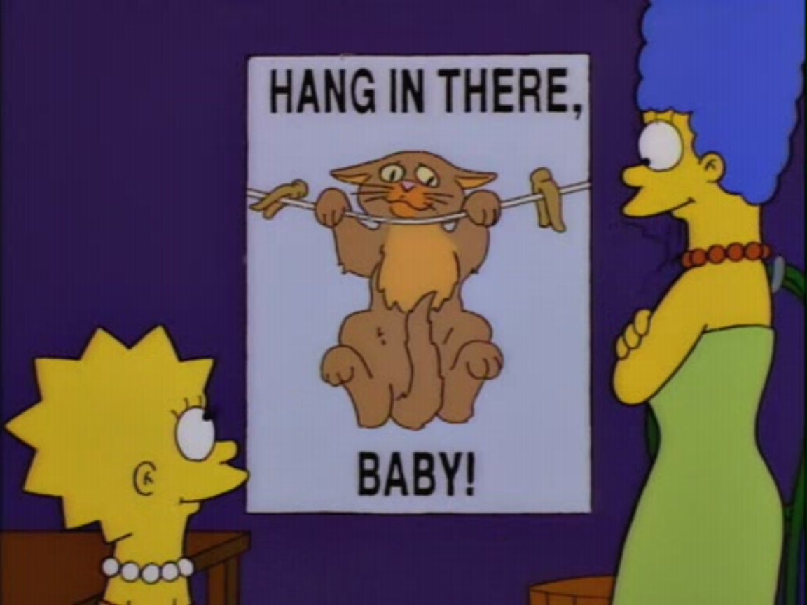 Hang in there, baby. You said it, kitty. [reads the small print