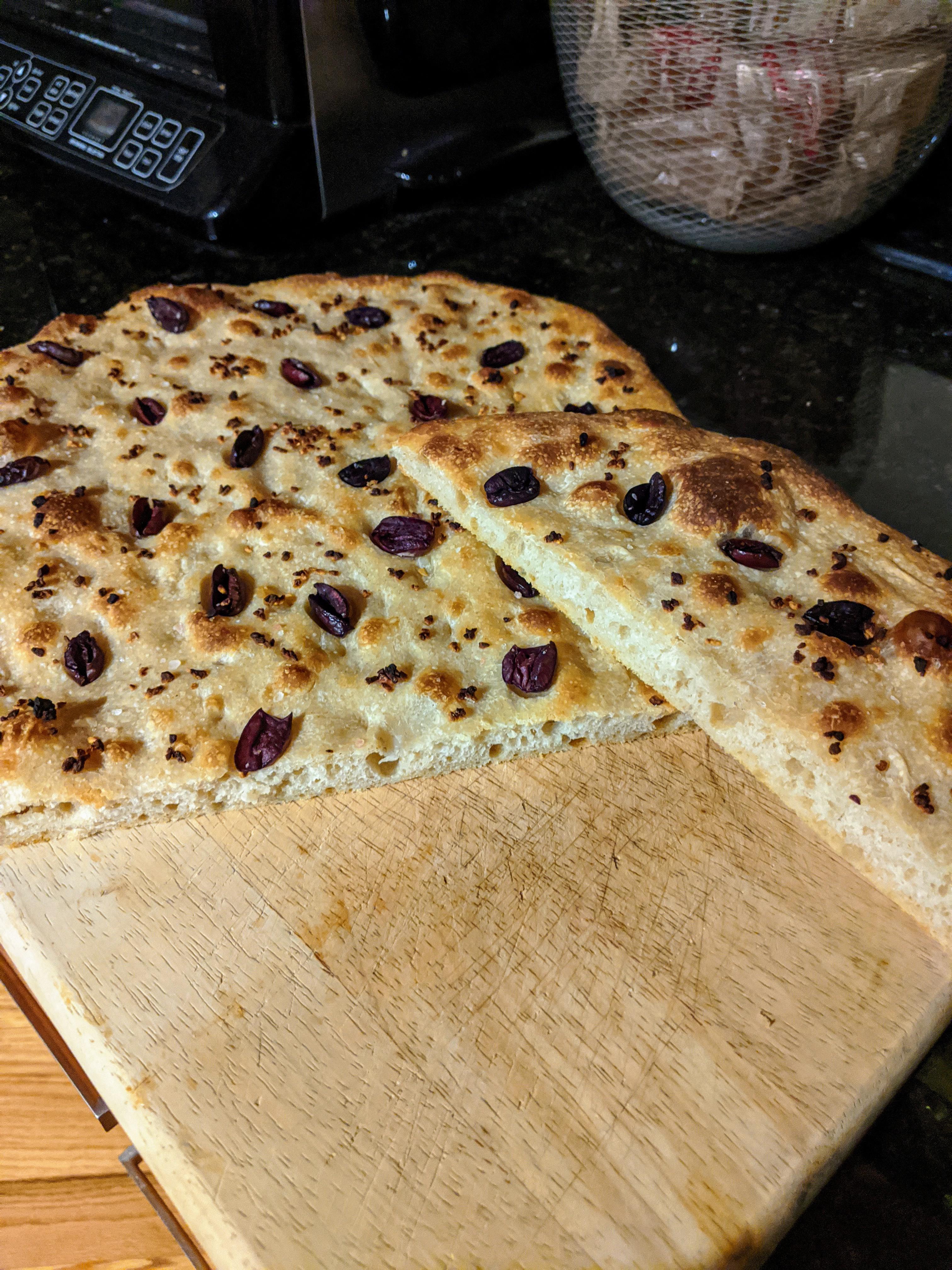 Kalamata olive and minced garlic flat bread. Starter leavened, but not
