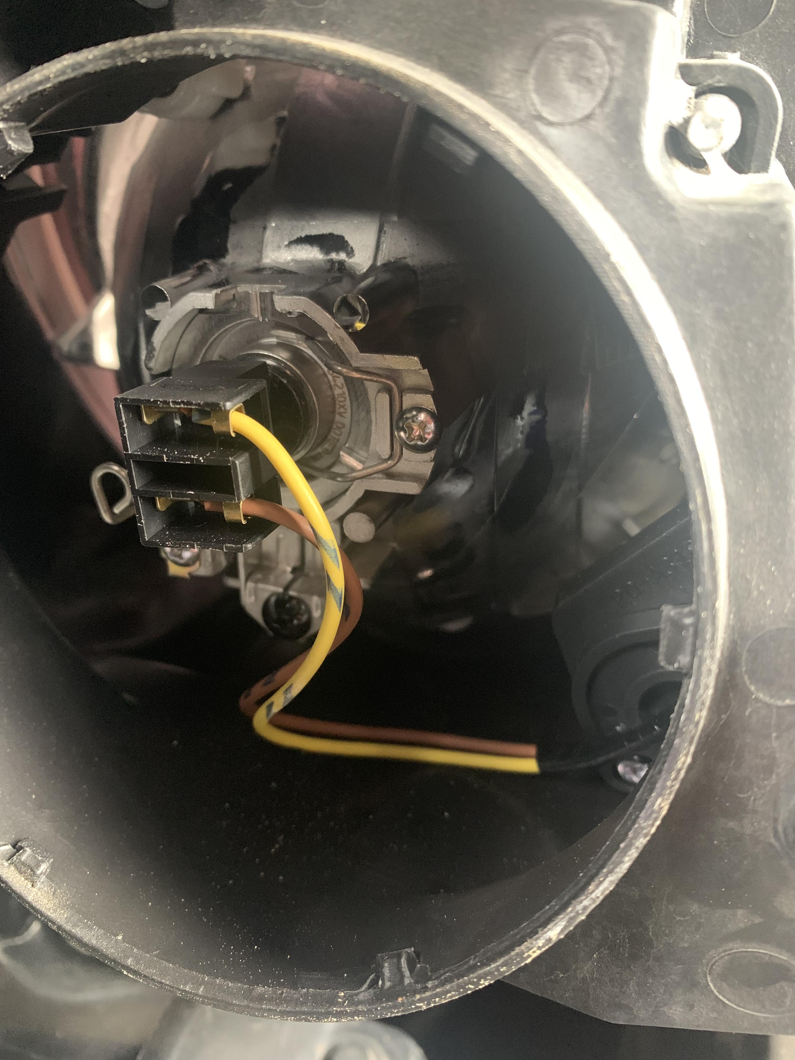 2010 low beam headlight out....Went to change the bulb when the driver