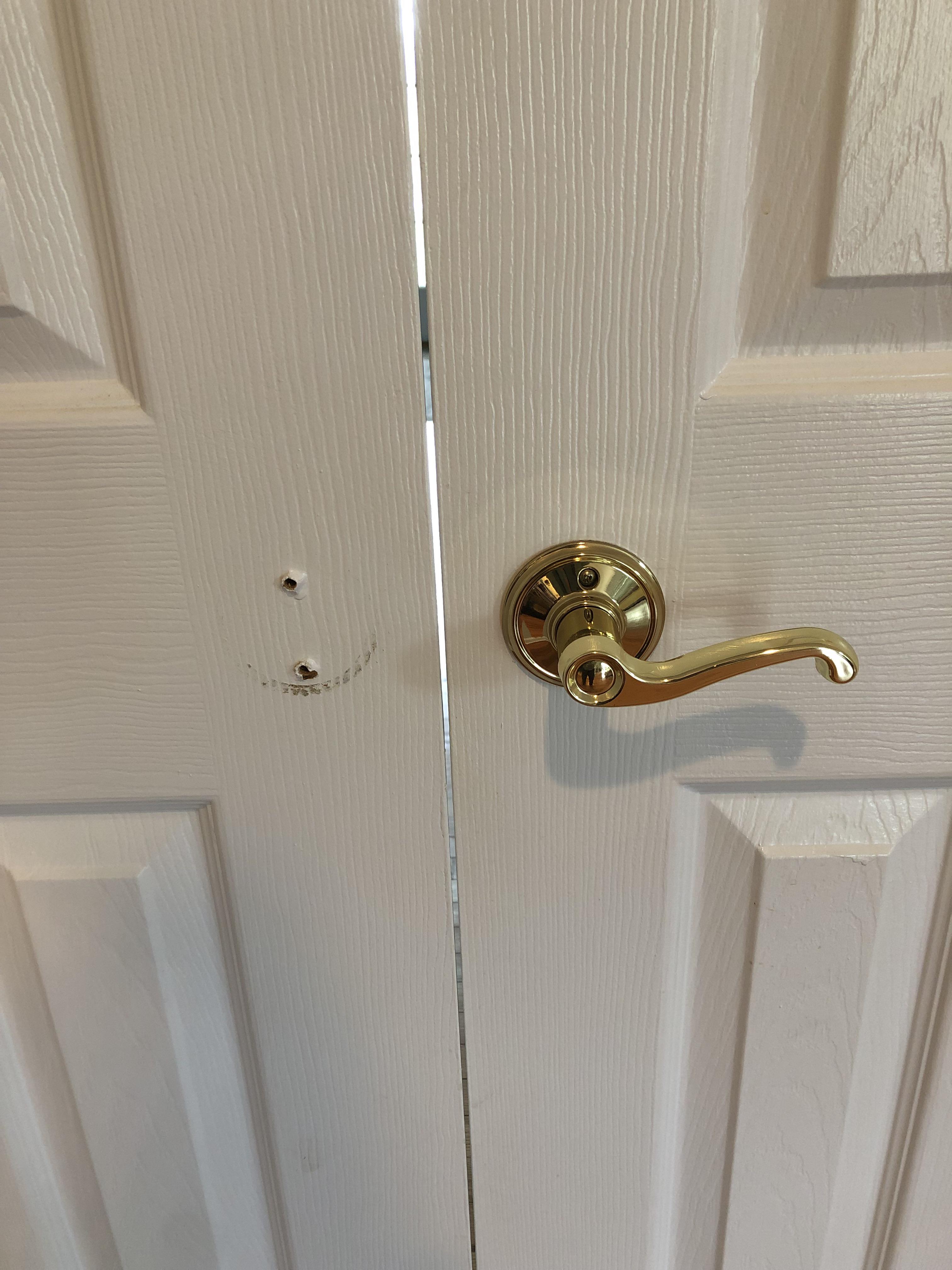 How can I fix this door? Screws ripped out for handle from kid hanging