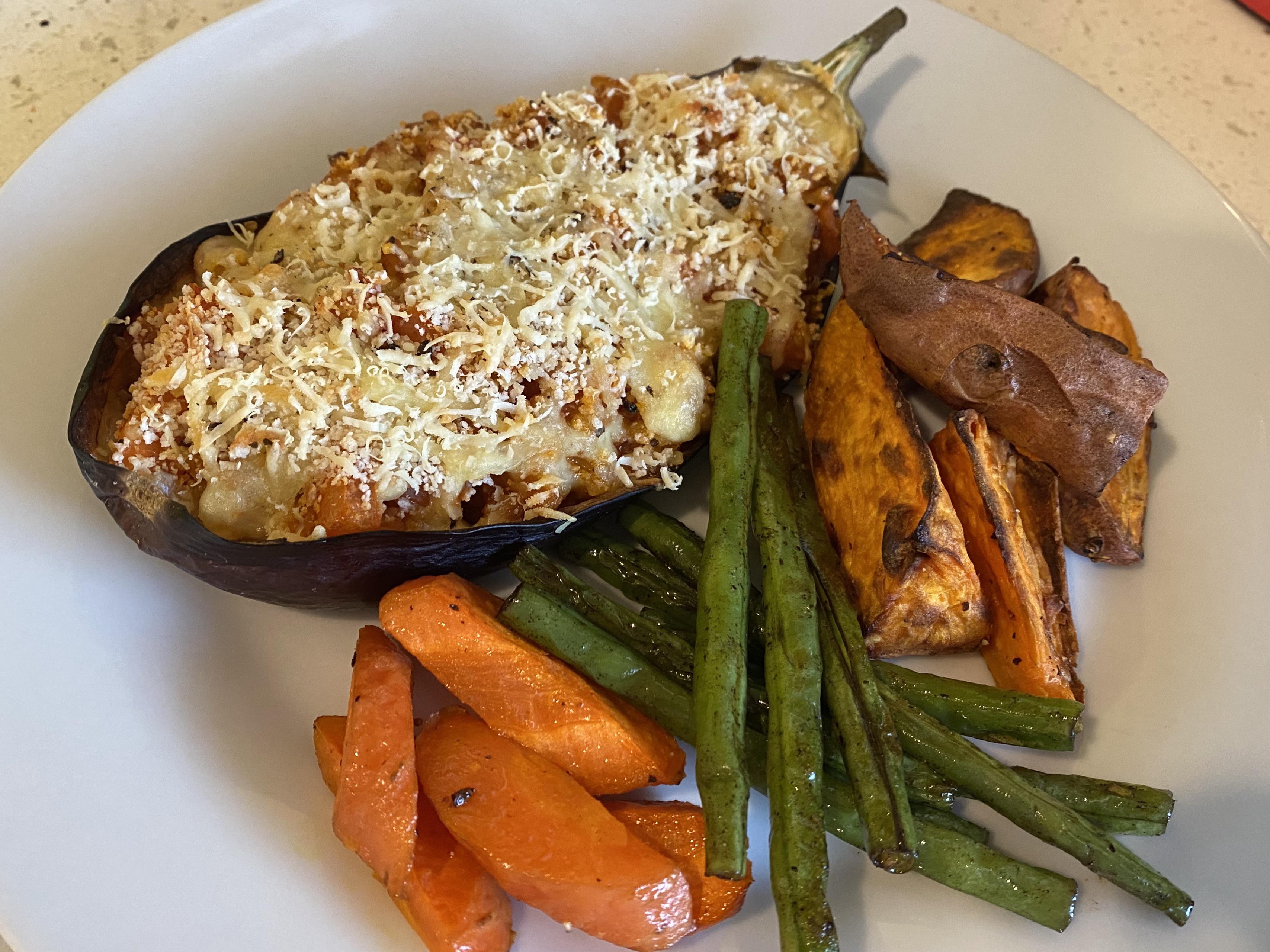 Eggplant parmigiana with roasted carrots and sweet potatoes. And a side