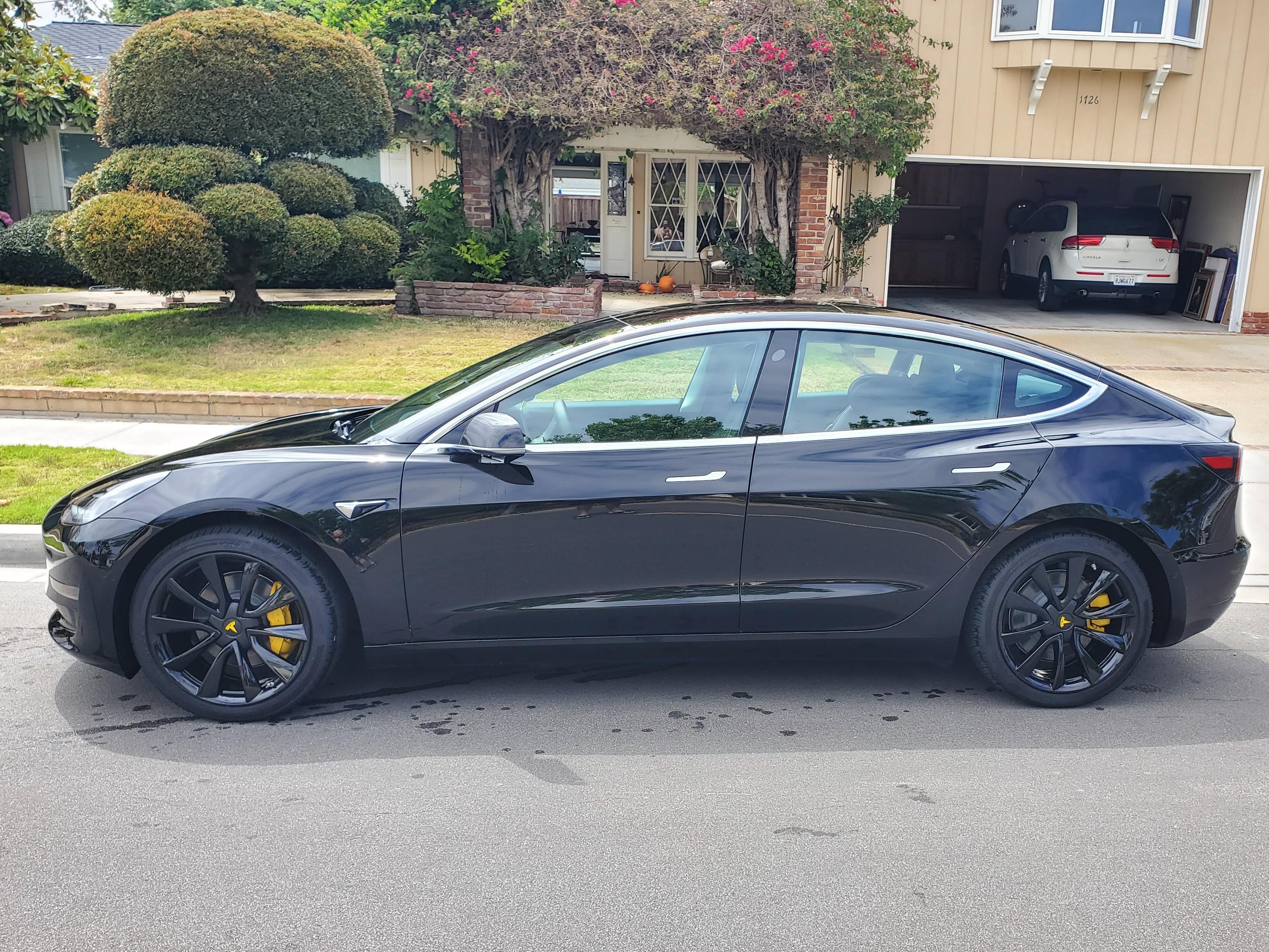 Stock 19" Wheels Powder Coated Black w/ Yellow Calipers r/Model3