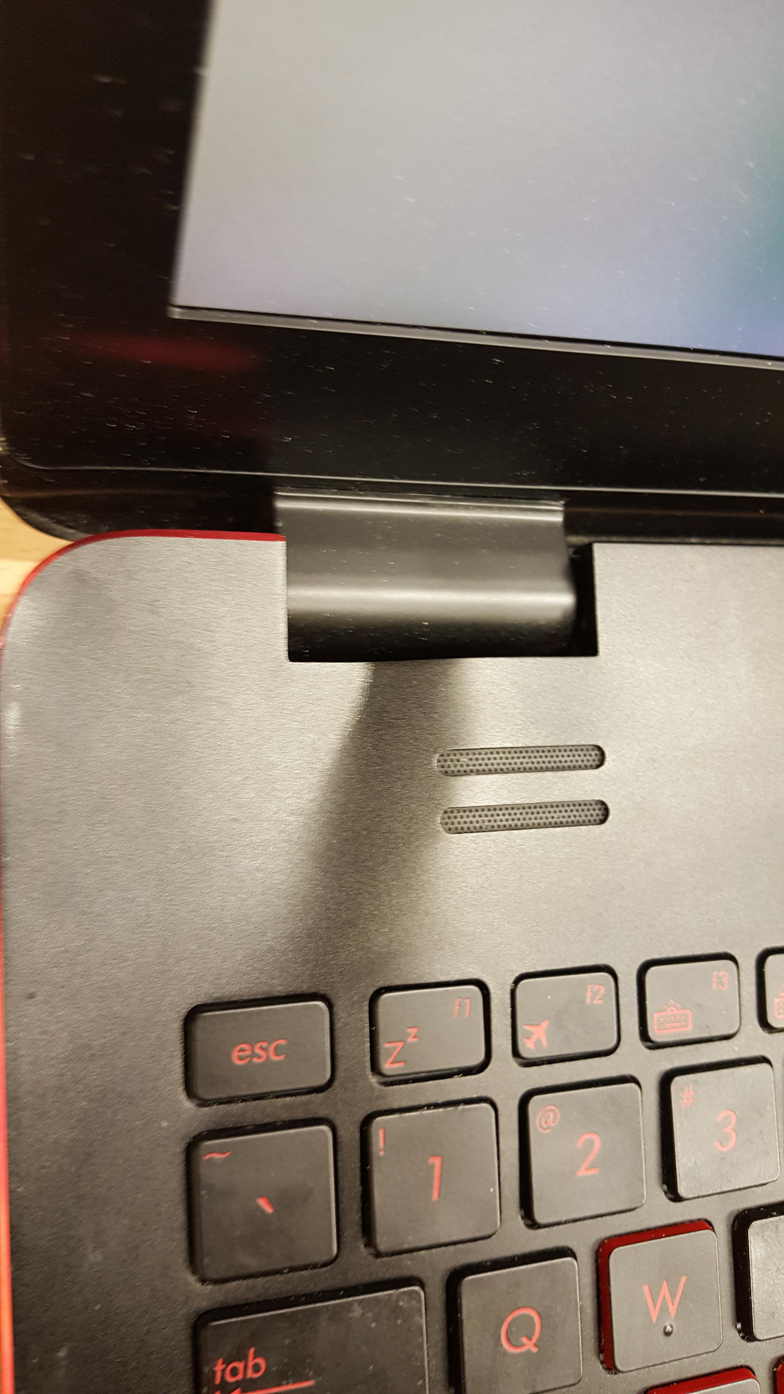 Laptop fell down. There is this kind of bulging now (?). Is it