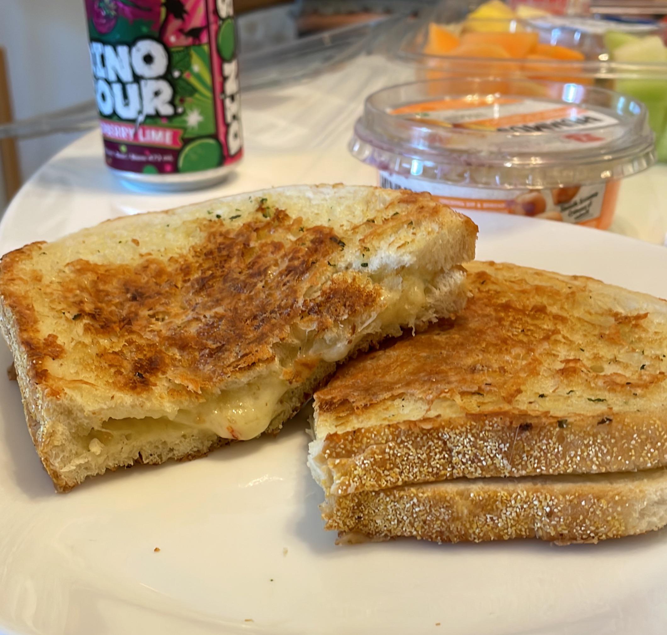 Parm crusted Monterey Jack, gruyere and creamy havarti grilled chz on