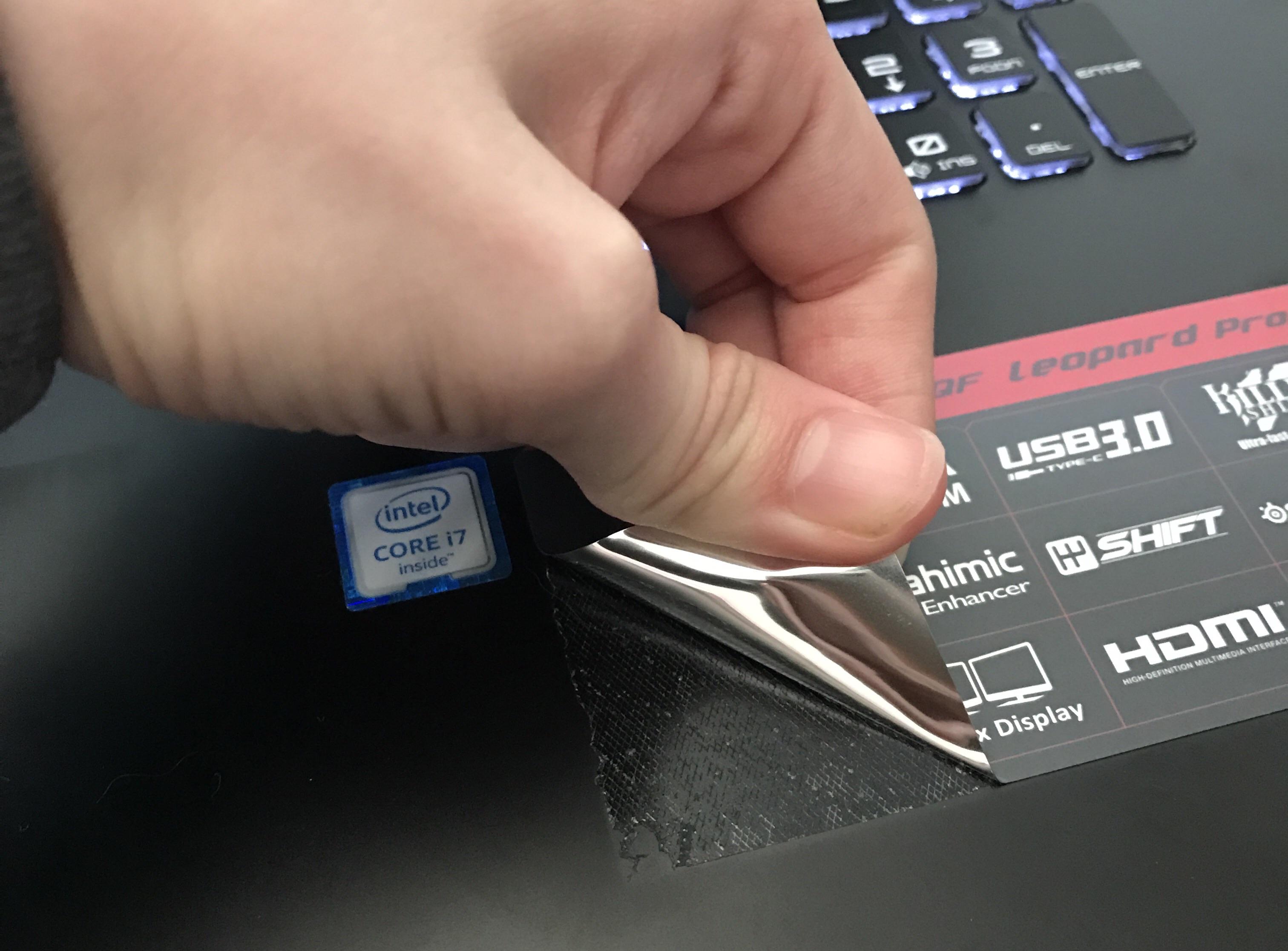 Sticker left a giant sticky residue on my brand new laptop. Grrrrr r