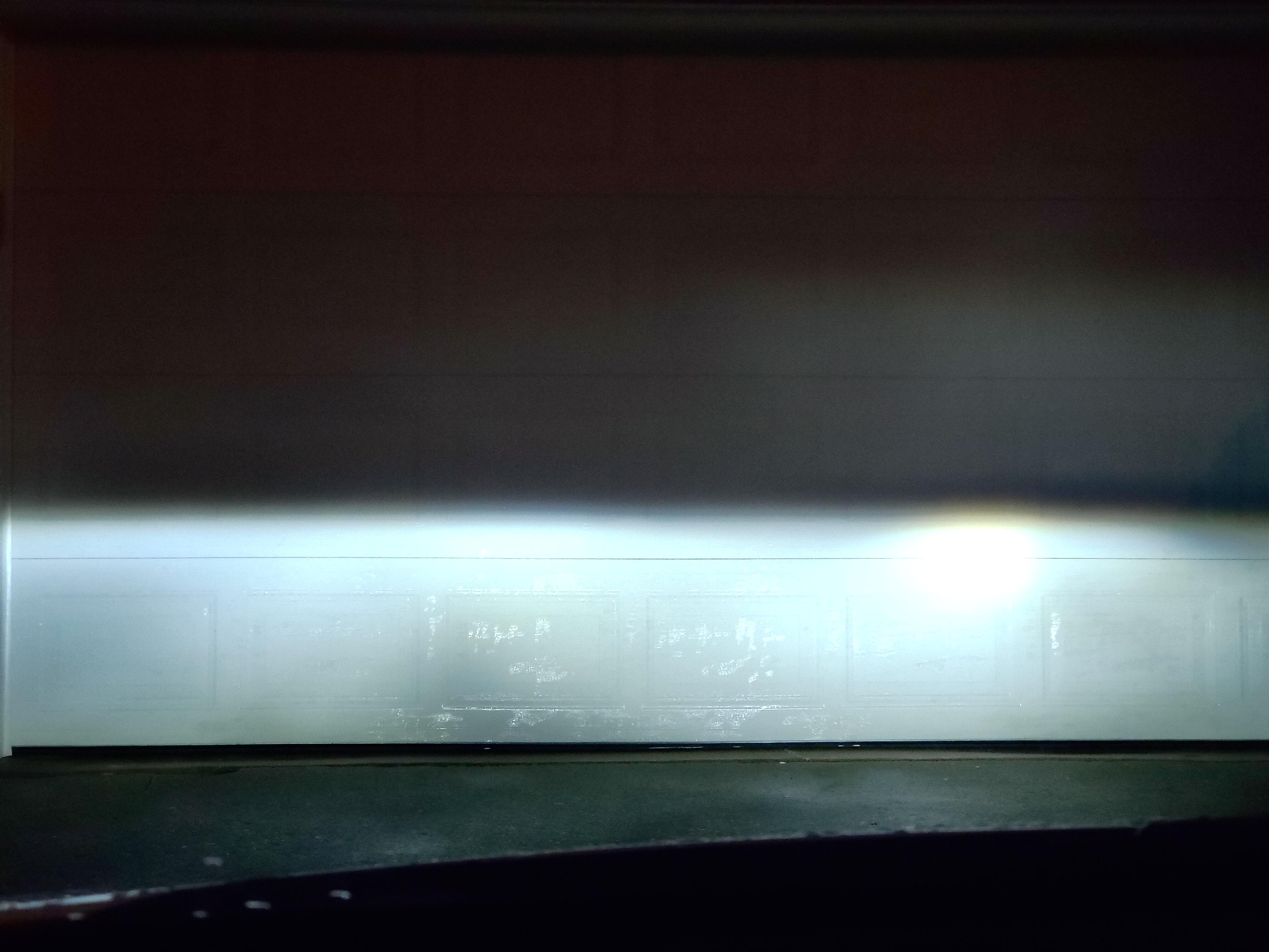 Passenger side Headlight higher? Forgive my ignorance. : r/auto