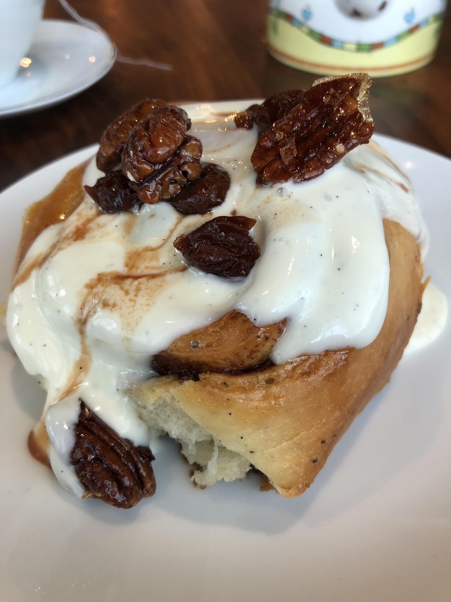 [I ate] Freshly Baked Cinnamon roll topped With Candied Pecans and