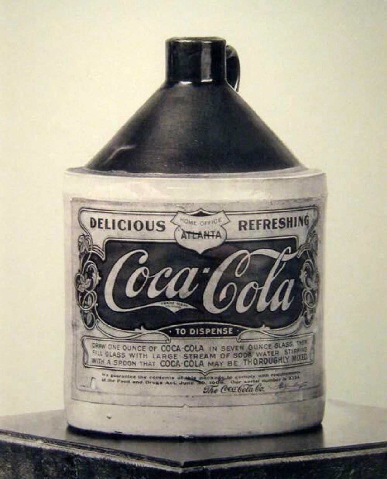 Coca Cola syrup bottle, circa 1906. Dispensing instructions included on