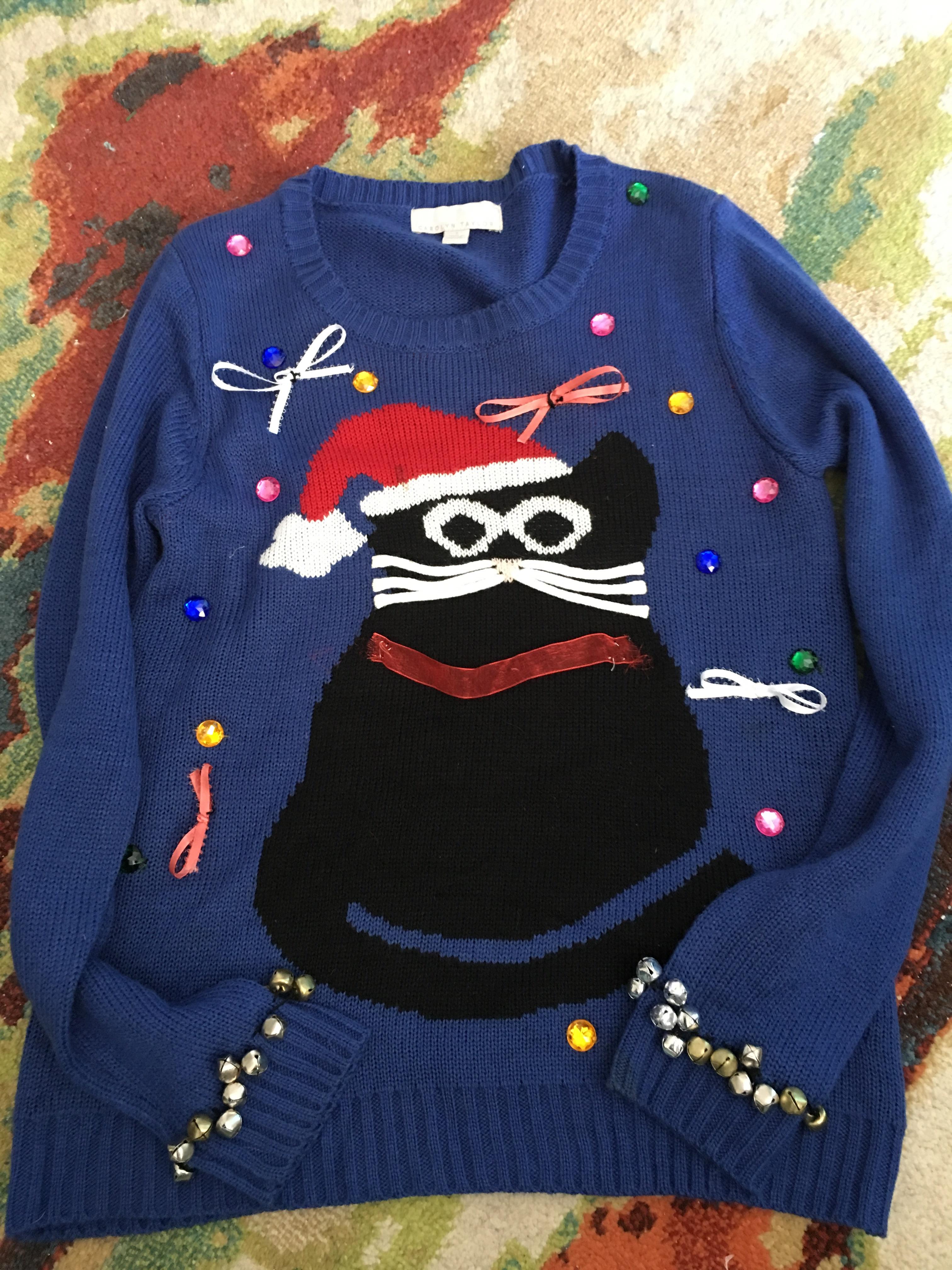 I picked up this black cat Christmas sweater today. I can’t wait until