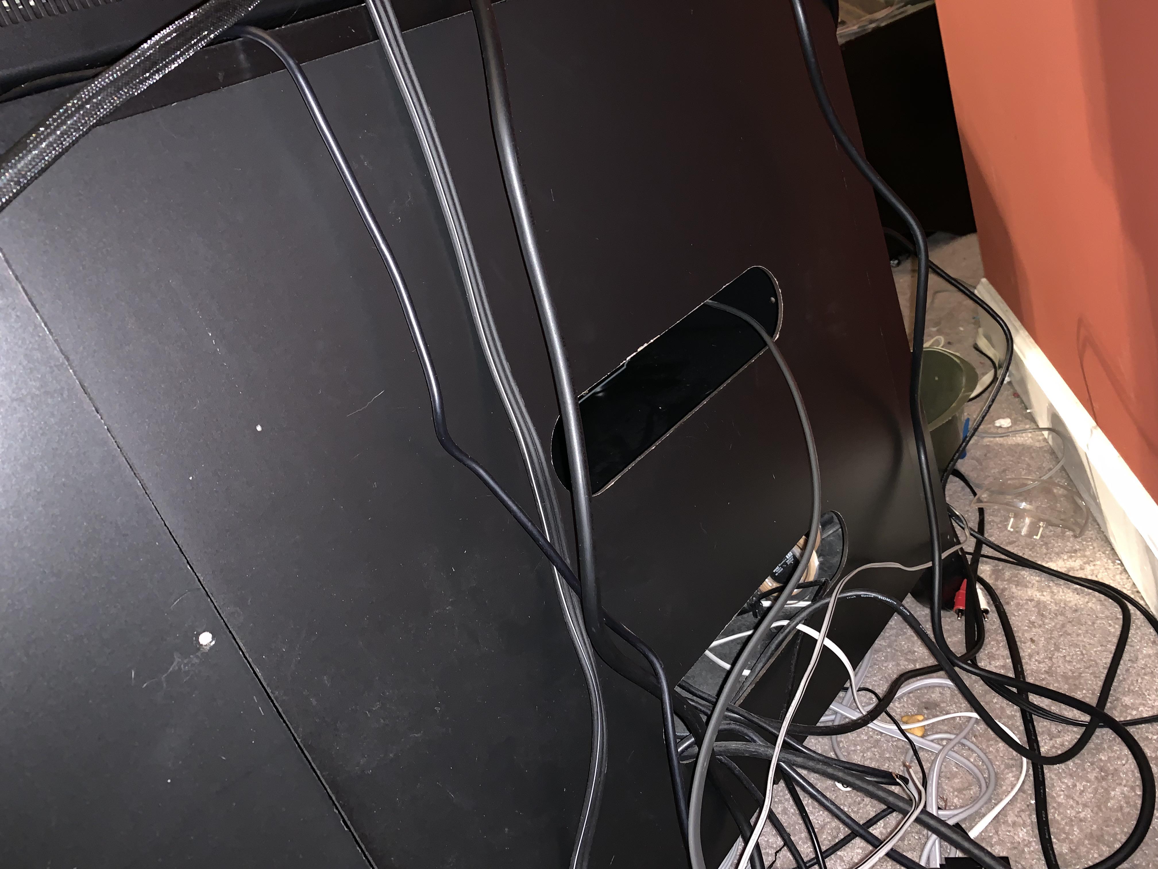 Does anyone know how to remove this panel off of a tv stand there are