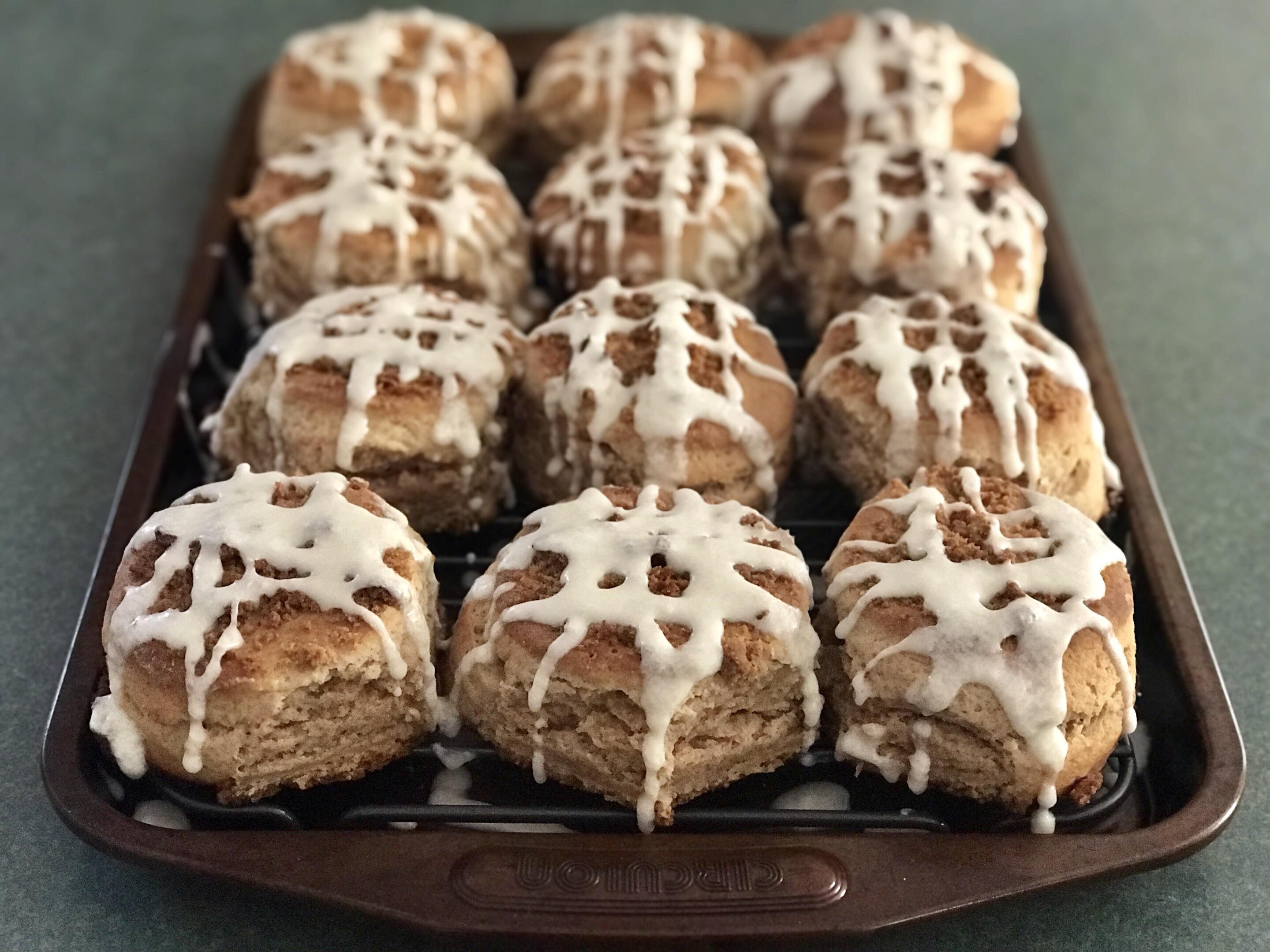 Crumble top cinnamon brown sugar biscuits with buttercream icing. Album