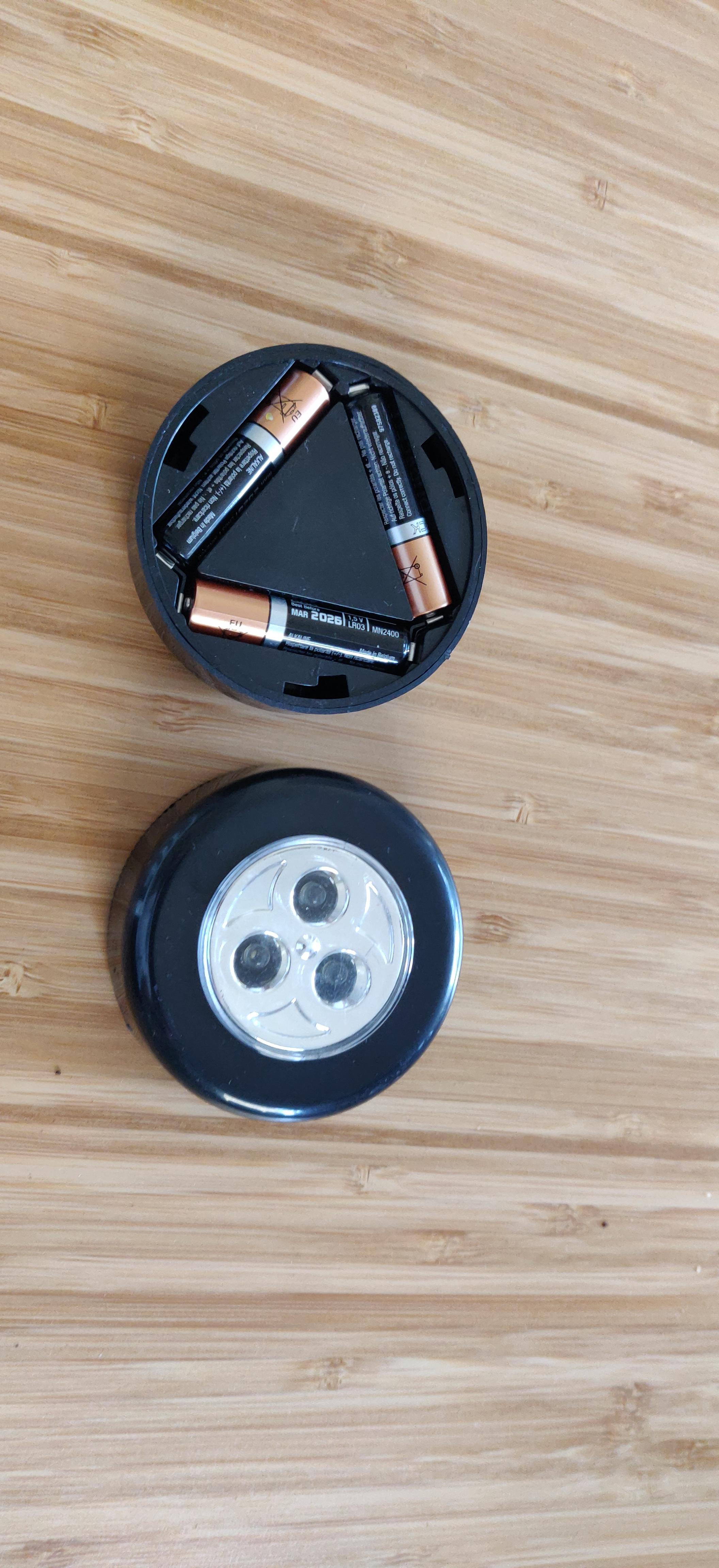 The way the batteries go in these Poundland LED lights r/mildlyinteresting