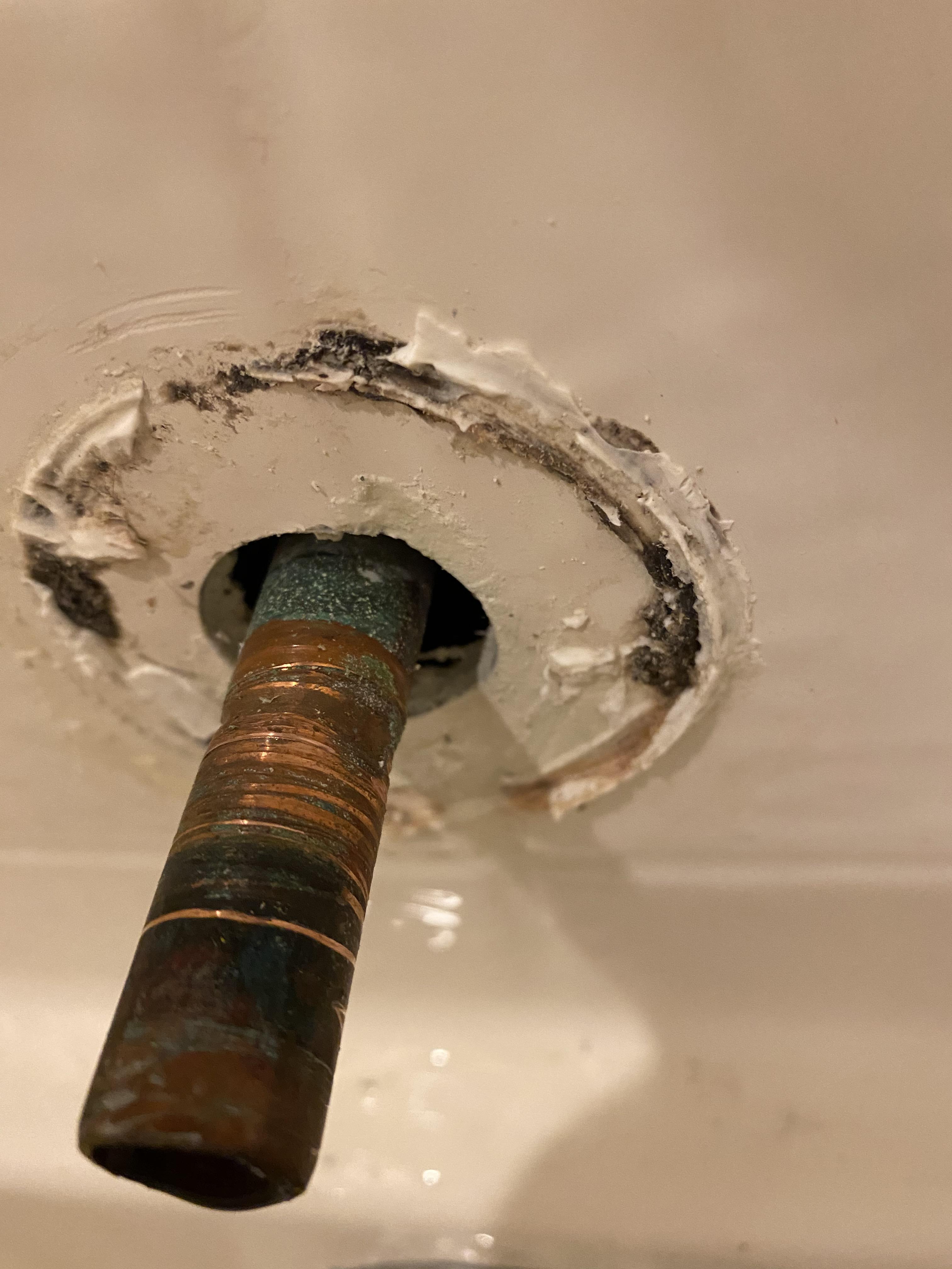 Tub spout copper tube dented from overtightened spout screw. What is