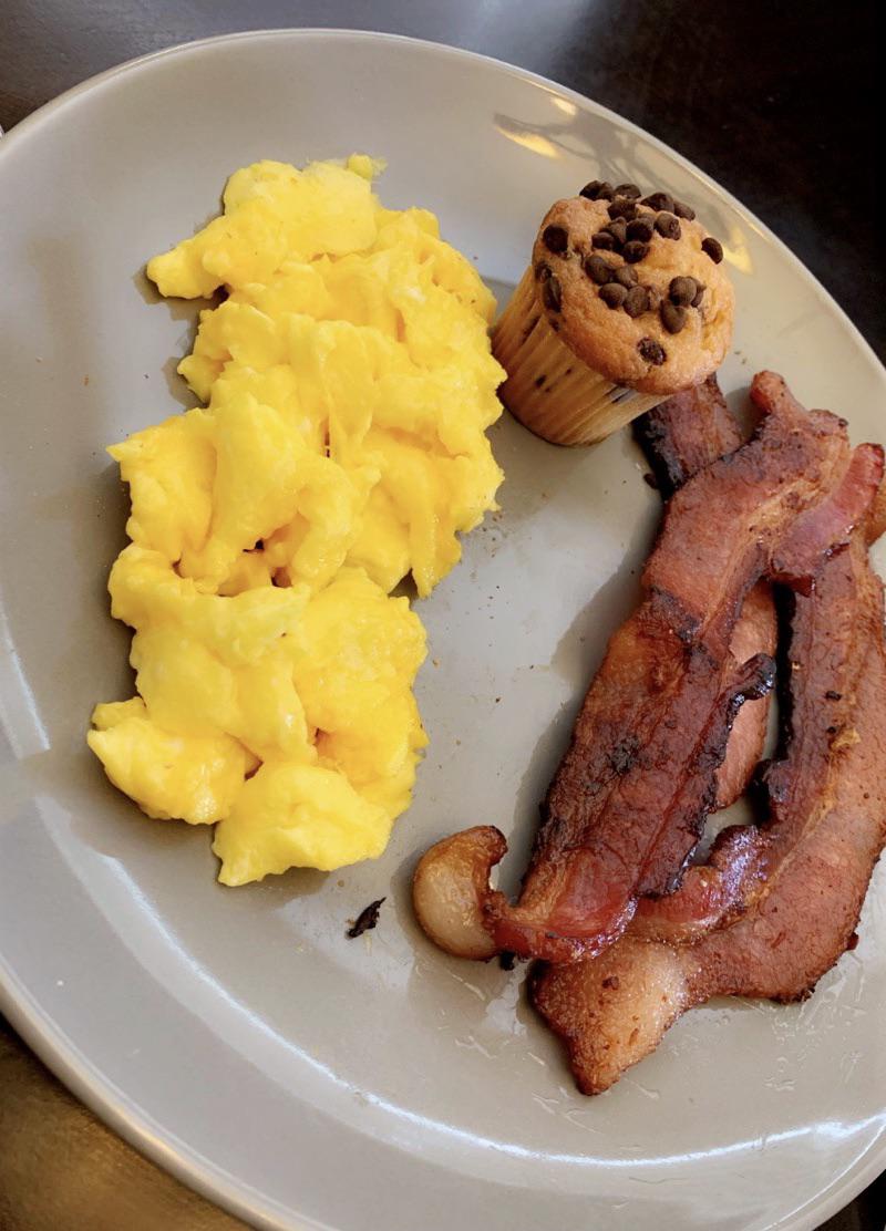 Scrambled Eggs with Cheddar Cheese, ThickCut Bacon, and a Mini Muffin