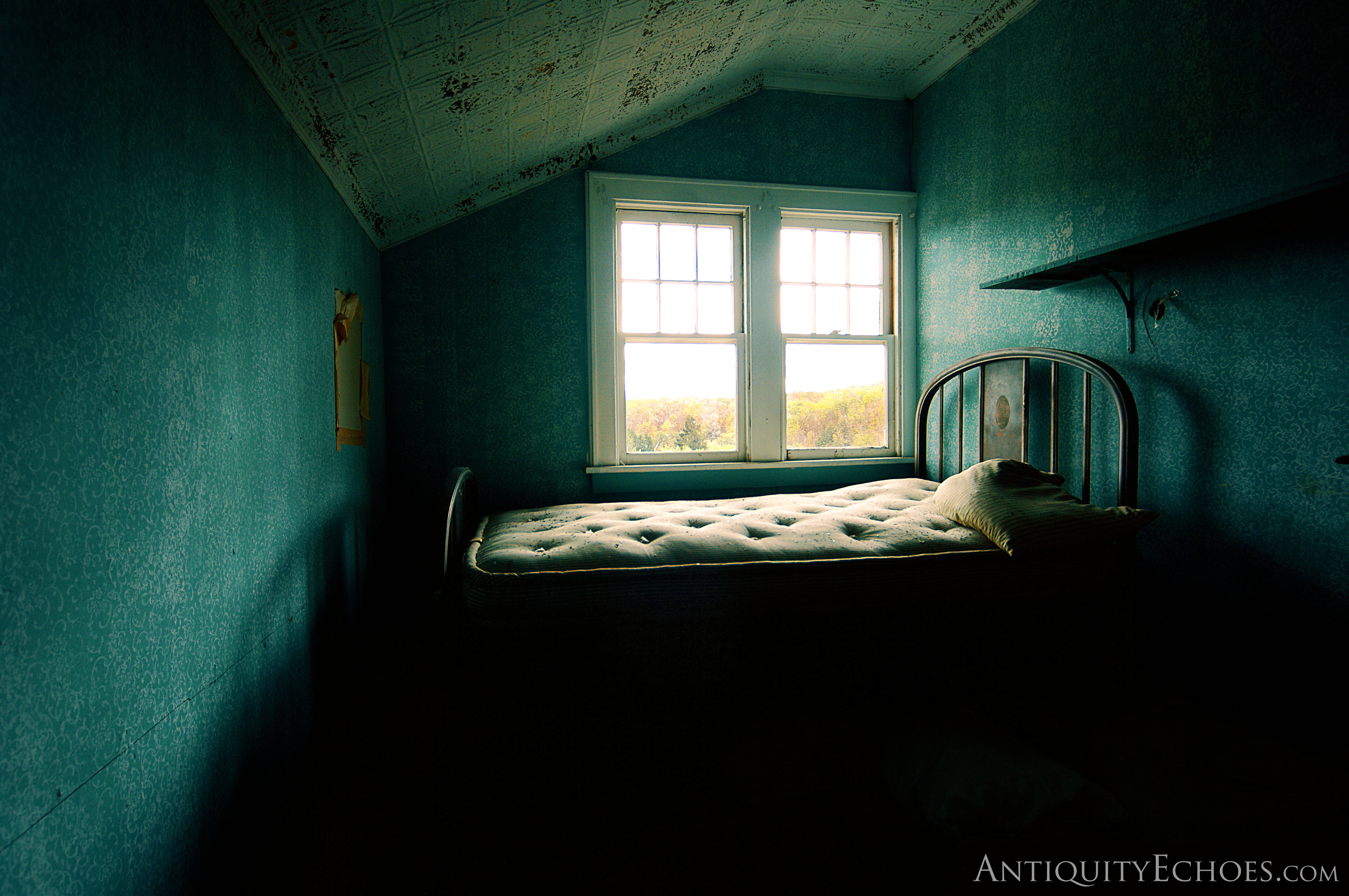 Old Bed in the Attic of an Abandoned Resort [OC] r/creepy